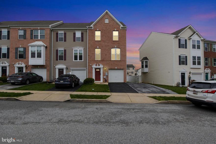 Welcome to this stunning brick front end-unit townhome in Hanover PA! Offering over 2,000 square feet of finished living space across three stories, plus an attached garage and an extended driveway for additional parking. The upper level features three bedrooms, including a primary suite with vaulted ceilings, a huge walk-in closet, and a private bathroom with a shower and soaking tub. Convenient upper-level laundry makes chores a breeze.

The main level boasts an open floor plan with 9-foot ceilings, a spacious kitchen with a large island, large pantry, and ample dining space. Step outside to the expansive composite deck—perfect for entertaining.

The finished lower level features a walk-out basement, half bathroom, and newer vinyl plank flooring. Don't miss this incredible home! And NO HOA!!!