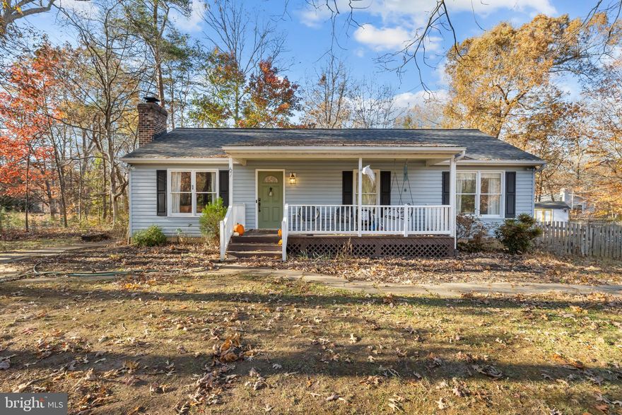 Charming 3-bedroom, 2-bath home on a desirable corner lot in the Lake Land’Or community! This inviting residence features a fully fenced backyard with a spacious deck, perfect for outdoor entertaining or relaxing in privacy. Step inside to a cozy living room highlighted by a wood-burning fireplace and durable laminate wood flooring throughout the main living areas. The bright kitchen boasts crisp white cabinetry, a convenient skylight for natural light, and sleek stainless steel appliances. The renovated primary ensuite bathroom is a standout, offering a luxurious tiled shower with modern sliding glass doors for a spa-like experience. Enjoy exclusive lake community amenities, including a clubhouse, swimming pool, and private beach access. Ideal for year-round living or a peaceful retreat! Mortgage savings may be available for buyers of this listing.