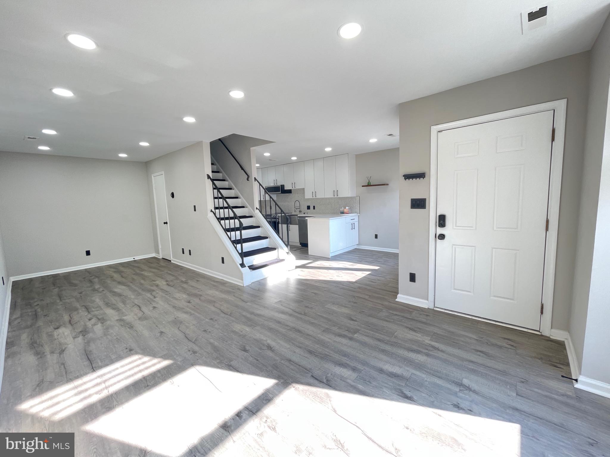 Pets welcome. Water and Internet included in Rent. Discover the charm of this beautifully renovated townhouse in the desirable Sunset Ridge community. With a Complete 2024 renovation, this 2-bedroom, 1.5-bathroom home boasts a contemporary Colonial style, featuring elegant flooring throughout. The heart of the home is the modern kitchen, equipped with energy-efficient stainless steel appliances, including a built-in microwave, self-cleaning oven, and dishwasher, ensuring culinary delights are just a step away. Enjoy the convenience of in-unit laundry with front-loading washer and dryer. Step outside to find exterior lighting and flood lights enhancing your outdoor experience. The community pool offers a refreshing retreat during warm days, while assigned off-street parking ensures hassle-free access. Available for lease starting August 1st, 2025, with flexible terms from 12 to 36 months, this property is perfect for those seeking a blend of comfort and convenience. Don't miss the opportunity to make this stunning townhouse your new home! Pets are welcome. Water, Internet included in Rent