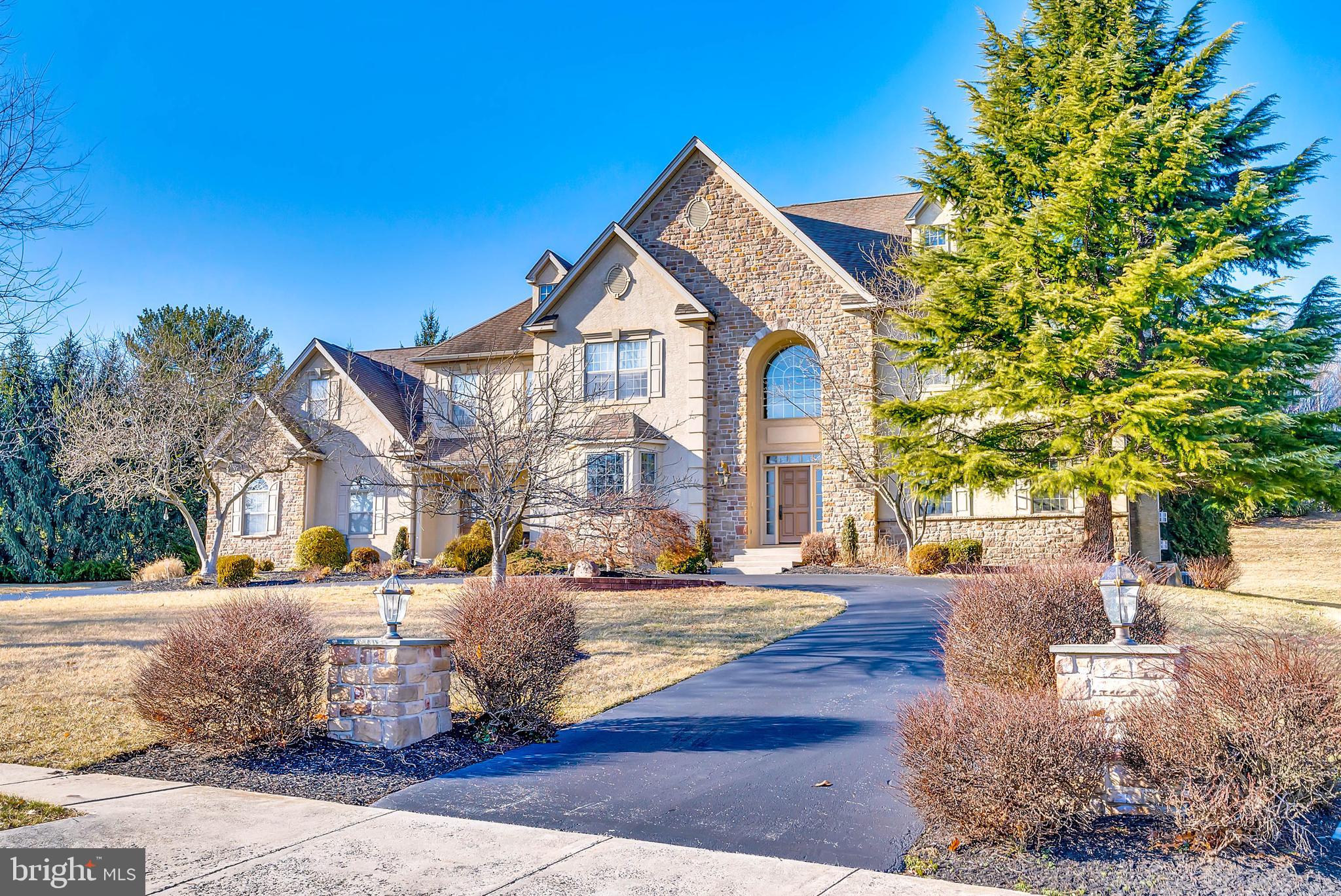 Welcome to 537 Monticello Ln, 5- bedroom, 4 full-bath and 2 half-bath home in the heart of Whitemarsh Township offers the perfect blend of timeless design and modern comfort. Step inside and be wowed by the grand two-story entry foyer that sets the tone for the elegance found throughout or enter through the convenient mud room where you'll will find a drop zone area complete with cubbies and bench seating along with a set of back stairs. This home is an entertainer's delight, whether hosting formal gatherings or casual get-togethers, you'll love the flow and space of this house. In addition to the step down great room with a gas fireplace and doors to the rear deck, there is a cozy den/home office with built ins, formal living room / music room with a fireplace and a formal dining room complete with a butler's pantry area. On the upper level, you'll find the primary suite with an enormous walk-in closet, a spa-like bathroom, and a dressing area. There are 4 additional bedrooms on the upper level.
Head to the lower level where it's all about play time.. you'll never run out of space or head outside and enjoy the summer nights on the expanded rear deck with built in bbq. area.
Three Car Side Entry Garage with a circular driveway.