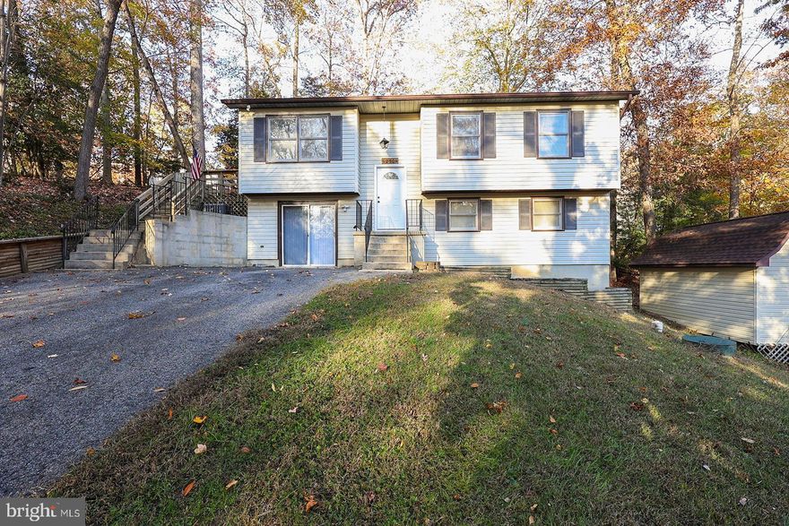 Charming 3 bedroom 1 bathroom Split Foyer waiting for a new owner just in time for the holidays!  Freshly painted and  bamboo flooring throughout the upper level.  Renovated kitchen with granite counters, stainless appliances and separate dining area.  Spacious bedrooms and updated full bathroom.   Sliders off the dining room open to the back deck with plenty of space to entertain, relax and enjoy your privacy.  Unfinished lower level ready to plan your dream basement and a rough in for an additional bathroom.   Shed with additional driveway.  Close to schools, shopping and area amenities.   Schedule your online appointment today.