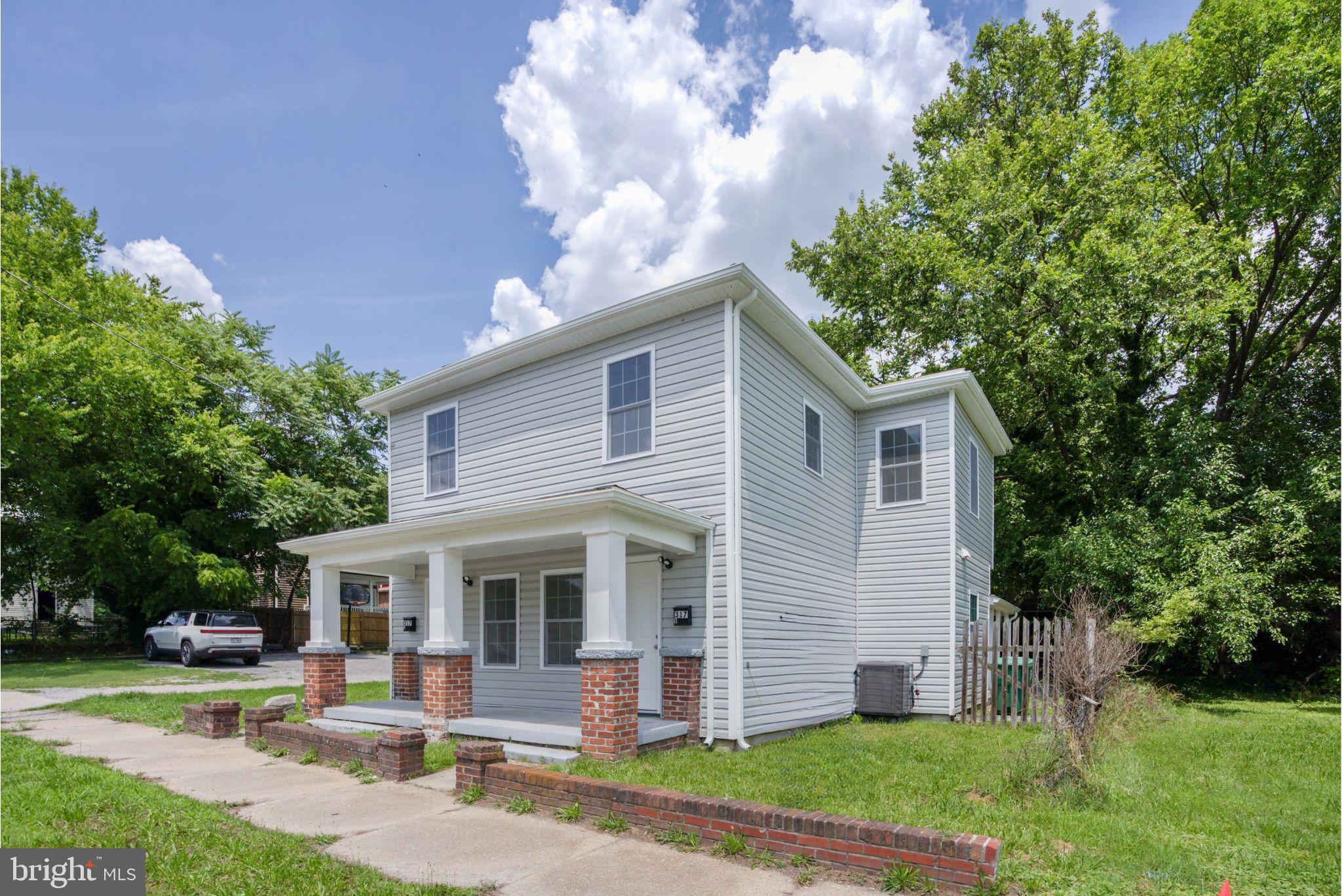Welcome to your new home! This beautifully renovated duplex is located in the heart of historic Petersburg, just minutes from charming downtown shops, restaurants, and Fort Gregg-Adams — making it ideal for both commuters and military families. Every detail has been thoughtfully upgraded: brand-new HVAC system, water pump, flooring, fresh paint, modern lighting, and a stylish kitchen featuring quartz countertops, sleek cabinetry, and appliances. With an open-concept layout, this home offers a bright, spacious feel perfect for entertaining. Each unit has its own entrance and utilities, making it a smart opportunity for house hacking — live in one side and rent out the other to a friend, family member, or tenant to offset your mortgage! Whether you're an investor, first-time buyer, or multi-generational household, this turnkey property is move-in ready and full of potential. Don’t miss out on this rare gem — schedule your showing today!