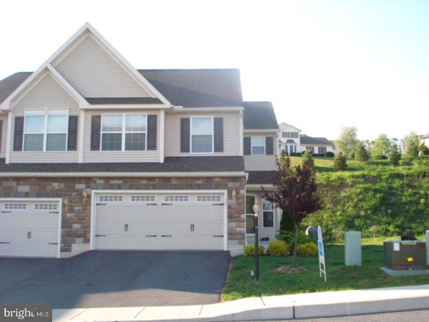 Just like new townhouse with two car garage, end unit with deck and small side yard. Rooms are freshly painted and most have virgin walls! Master suite with walk-in closet and full bath. Upgraded flooring in the dining room and kitchen. Basement was just insulated and drywalled with outside entrance. Kitchen has center island with generous cabinet and countertop space. Don't wait to build this is available now! Community sewer. Homeowner's Association fee of $65/month for grass and snow removal.  Mailing Address Continued: Schuylkill Haven  Color: Beige  Amp: 200