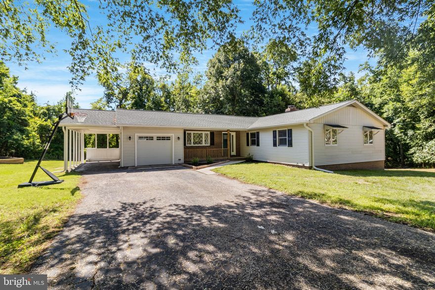 Welcome home to your beautifully renovated ranch, nestled on 3.06 acres, that offers the perfect blend of modern comfort and rustic charm. Boasting 3 spacious bedrooms and 3 full bathrooms and tons of updated amenities! As you step inside, you'll be greeted by a bright and airy floor plan, accentuated by gleaming luxury vinyl plank flooring and an abundance of natural light. The living area features one of two cozy wood fireplaces, perfect for those chilly evenings. The heart of the home, the kitchen, features brand new stainless steel appliances, quartz countertops, and ample cabinetry. The main floor also includes three generously sized bedrooms with brand new carpet in each, with the primary suite offering a private bathroom and ample closet space. Each bathroom has been meticulously updated with modern fixtures and finishes. The spacious, finished walk-out basement provides endless possibilities—whether you envision a family entertainment space, a home gym, or a guest suite. The second wood fireplace adds a warm and inviting touch to this versatile area. Rest easy knowing that this home comes equipped with a BRAND NEW septic system, HVAC system, and water heater, providing peace of mind and energy efficiency. Additionally, the roof was replaced in September of 2017. Step outside to the inviting deck, perfect for sipping your morning coffee or hosting summer barbecues. The  expansive 3.06-acre lot offers plenty of space for outdoor activities, gardening, or simply enjoying the outdoors. Don't miss this opportunity to own a completely renovated home in Northern Calvert County! Ideal commuter location in a top rated school district. Joint Base Andrews (24 miles), Washington DC/Joint Base Anacostia-Bolling (30 miles), Annapolis (35 miles), Alexandria, VA (33.6 miles).