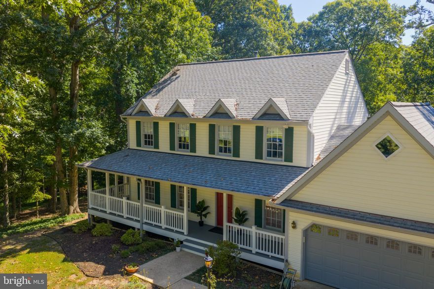 *** Open House postponed until 2/28 due to weather!*** A lovely colonial home awaits, completely move-in ready and nestled in a peaceful wooded neighborhood with easy access to Route 3 and Fredericksburg. Enter the home through a welcoming foyer that opens up to the living room, a light - filled sun room for relaxing with bucolic views, and a formal dining  room just right for meals with  your guests. A remodeled  powder room is also on the main level. The beautifully updated kitchen has newer stainless steel appliances with lots of room for creating delectable dishes. The kitchen is open  to a nice breakfast nook with views to the beautiful back yard and warm  family room with fireplace. Upstairs you'll find a spacious primary ensuite and three other sizable bedrooms and a full bath. The bedrooms, hall and stairs all have fresh, new carpeting. A large walk-out basement includes a very long entertainment room with fireplace, an exercise room, a full bath and a mud-room to transition inside from the back yard. That back yard is the height of serenity where you can enjoy a variety of birds, deer and other wildlife, garden to your hearts desire or simply sit on your spacious composite deck and enjoy the peace. All this is within just a few minutes to downtown Fredericksburg, historic Chancellorsville and the mighty Rappahannock River. Come and see this beautiful home!