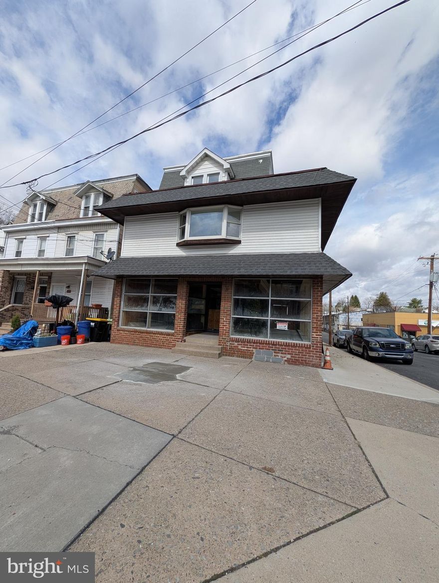 The possibilities are numerous for this HUGE commercial and residential property with approximately 24000 sq ft in the desirable neighborhood of Yorkville.  Location is a highly visible trafficked area.  New roofs and updated electrical have been completed.  The first floor is the entire length from Market to West End Ave.  Originally a retail space but so much potential. New office area and large half bath added.  The building has 3 separate areas on the first floor.  Three apartments are ready for occupancy.  There are two 2 bedroom and a 3rd floor 1 bedroom.  These have separate entrance from the outside.  There is the possibility for 2 or 3 more residential units in the back upper level.  The basement is also the entire footprint of the building.  There are 2 garage entrances from West End Ave.   That space itself is spacious.  Check with Pottsville zoning for all potential uses.  This is a must see to appreciate.