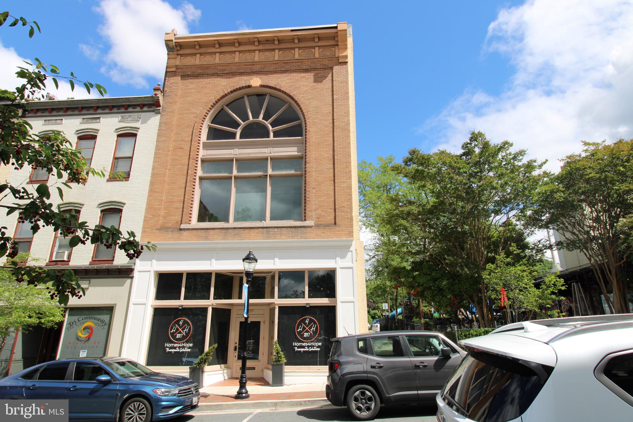 Unlock the potential of your business with this versatile office building located in the heart of Downtown Salisbury, MD. This two-story commercial property offers a flexible layout ideal for professional, administrative, or service-based businesses seeking visibility, convenience, and ample space. The property features 7 total office spaces between downstairs and ground level. A large conference room , a kitchenette area and two bathrooms. There’s street parking available along with a parking lot and parking garage within walking distance of the front door.