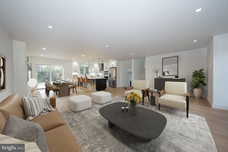 Luxury Living, Completely Reimagined — A Modern Masterpiece on a Private Cul-de-Sac  

Step into a home where every detail has been intentionally redesigned for today’s lifestyle. Fully renovated down to the studs, this 3,313 sq ft split-level foyer delivers a seamless blend of craftsmanship, modern comfort, and elevated style.

A bright, open-concept main level showcases 7" European Oak hardwood floors, an abundance of LED recessed lighting, and expansive Marvin windows and doors  that bring in exceptional natural light. The show-stopping kitchen features Century custom cabinetry, quartz countertops, a premium KitchenAid appliance suite, custom built-ins in the dining area, and an oversized island—perfect for both cooking and entertaining.

Ascend to the upper level to discover the primary suite oasis—a private retreat featuring a luxurious bath with heated floors, an oversized multi-head shower, soaking tub, dual vanity, and separate water closet. A spacious custom walk-in closet leads to an additional finished room ideal for a home office, yoga studio, or seasonal storage.

 The home also offers three well-appointed bedrooms, each with custom-fitted closets. Two bedrooms share a stylish hall bath with a bathtub, dual-sink vanity, and private water closet, while the third enjoys its own ensuite with a walk-in shower.

A half bath and custom laundry room/mudroom make daily living a breeze. The mudroom is designed with built-in cabinetry—ideal for keeping shoes, bags, sports gear, and all the kids’ essentials neatly organized. Whether you're coming in from the garage or heading out for the day, this stylish drop zone helps keep everything in its place

The lower level offers an inviting second living space with durable LVP flooring, a wood-burning fireplace, and a beautifully crafted custom bar complete with sink and additional Zephyr refrigerator—an entertainer’s dream. 

Every system in the home has been upgraded, including a brand-new 320-amp electrical service, full insulation upgrade, and dual new HVAC systems, delivering comfort and efficiency year-round.

 Exterior enhancements include new lighting and a modern garage door, and a large deck accessed from the dining area  making the home as impressive on the outside as it is within.