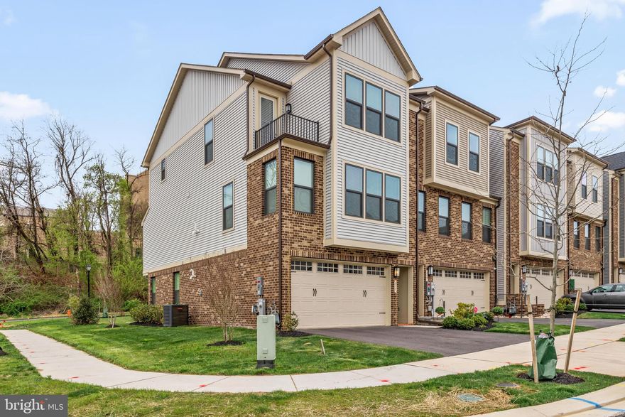 Welcome to 217 Hickory Hollow Court, a beautifully maintained newly constructed, low maintenance, End of Group townhome offering spacious living, modern finishes, and an attached 2-car garage in the heart of Cockeysville. 

This bright and inviting home features hardwood flooring and carpet throughout. The entry-level includes a versatile rec room or office space and a convenient half bath—ideal for remote work or relaxation.

The main level boasts an open floor plan with a spacious chef's kitchen complete with stainless steel appliances, Farmhouse sink with auto touch sense faucet,  a large center island, and abundant white cabinetry. The kitchen opens to a balcony perfect for enjoying fresh air, and a cozy fireplace adds warmth and charm to the living area. A second half bath completes this level.

Upstairs, the primary suite features a generous walk-in closet and a luxurious en-suite bath with a soaking tub, separate shower, and double sink vanity. Two additional bedrooms and a full hall bath provide plenty of space for comfort and convenience.

Enjoy all that this well-appointed home and its desirable location have to offer. Schedule your tour today!