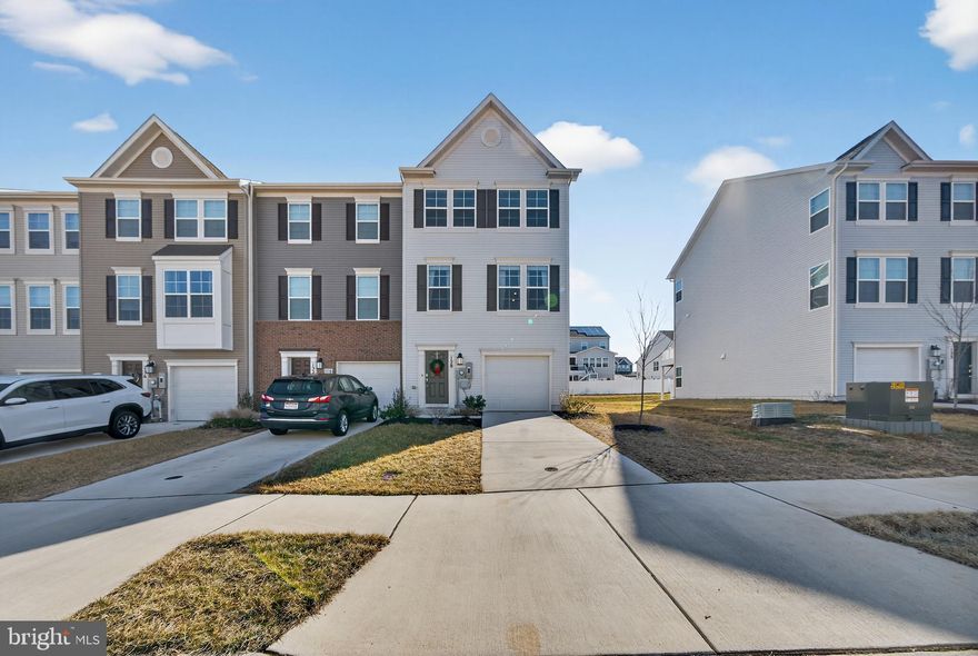 END UNIT Savannah model on a premium corner homesite in Norborne Glebe offering immediate move in without the wait of new construction by Lennar. Built in 2024, this fully finished three level townhome features 3 bedrooms, 2 full bathrooms, 2 half bathrooms, and over 2,097 square feet of thoughtfully designed living space filled with natural light from additional end unit windows.

The gourmet kitchen is the centerpiece of the home, showcasing a large granite island, white cabinetry, stainless steel appliances, upgraded hood vent, and open concept layout that flows seamlessly to the 10x18 composite deck. The corner lot location provides added outdoor space and enhanced privacy compared to interior units.

The entry level is fully finished with a spacious recreation room, half bathroom, and both front and rear access, offering flexible space for a home office, gym, or additional living area. Upstairs, the primary suite features a walk in closet and a luxurious bathroom with double vanity and a tiled shower with built in seating. Laundry is conveniently located on the bedroom level.

Additional highlights include a one car garage, private driveway, installed blinds, and move in ready condition. Unlike builder inventory, this home is complete and available now without construction delays.

Norborne Glebe offers excellent community amenities including a pool, two tot lots, basketball court, pickleball and tennis court, walking trails, and plenty of nearby overflow parking, making it an ideal place to live and enjoy.

This is a rare opportunity to own a premium end unit in a sought after community without the wait of new construction. Enjoy the added benefit of no active construction directly behind, in front, or to the sides, providing enhanced privacy and a peaceful setting from day one. Unlike buying brand new, you can move in with confidence knowing your surroundings are already complete and established.

Professional photos coming 3/4.