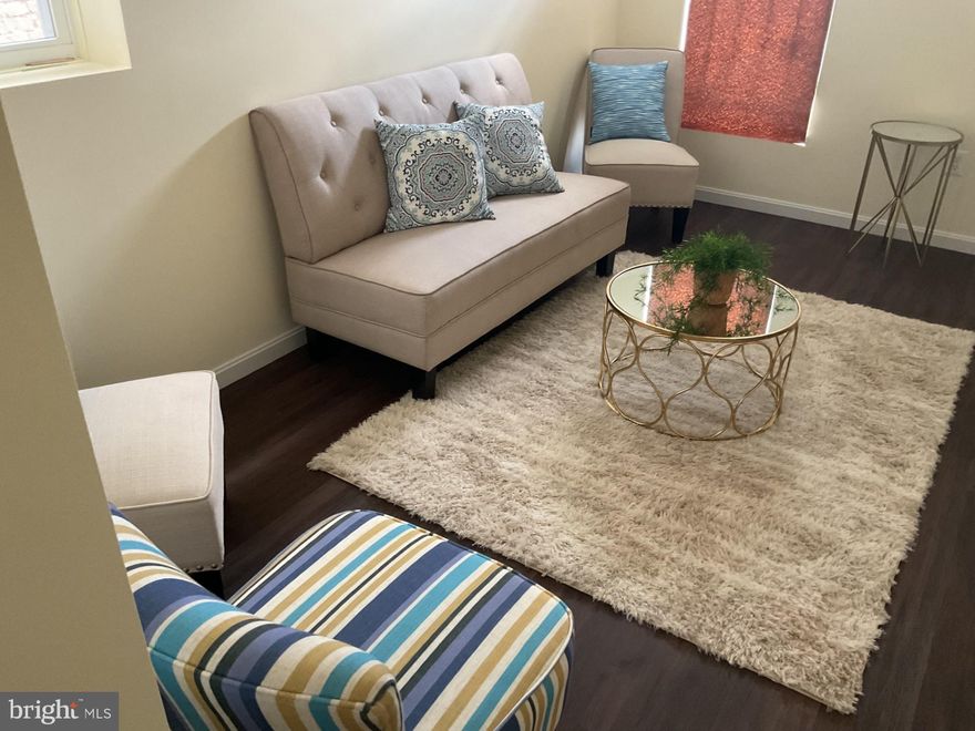 Come and take a look this potentially 4 bedroom 3 Full Bathrooms and 1 half Bathroom all Brick Colonial Rowhouse.  It is fully renovated from top to bottom, the basement up to the Main Level, the  Upper Level 1 and Upper Level 2 on the top floor. It comes with all new appliance, a partially finished basement with a full bath, and extra space in the basement for storage or other personal use.  It is located in the up and developing  East Baltimore Midway Neighborhood. People are  buying, renovating and moving in.  Along with its ample space, this three level carpeted Townhouse comes with a Deck, overlooking a little neighborhood park, and a rear private parking pad which provides an Off -Street Parking advantage, especially during the winter snowy months. Walk from the basement right to your vehicle parked in your OWN Parking Space. Some photos are staged.