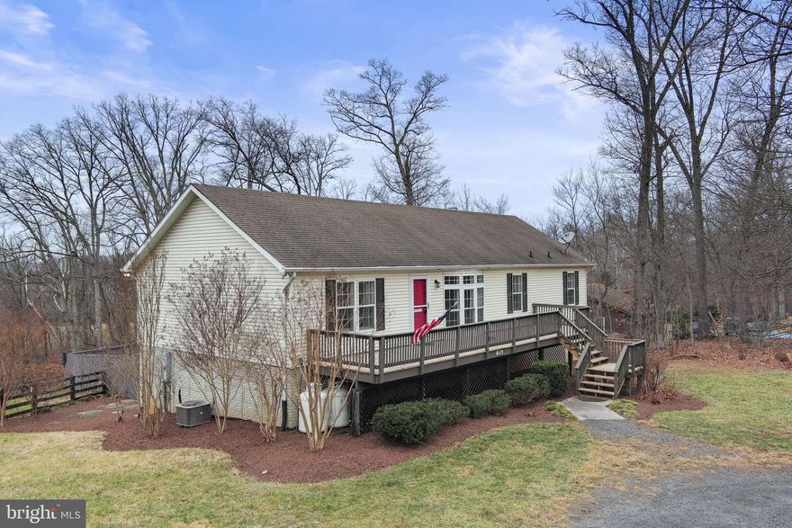 Welcome home to this move-in ready retreat where thoughtful updates, privacy, and an unbeatable location come together—just bring your furniture!

Nestled on a private 3.49-acre lot with no HOA, this 3-bedroom, 2-bath home offers peaceful living just minutes from the Shenandoah River, National Parks and Forest, and less than 10 minutes to Route 66 and downtown Front Royal. Enjoy convenient access to shopping, dining, recreation, and numerous nearby golf courses—all while enjoying a secluded setting.

Inside, the home features newer LVP flooring (2018) and fresh paint throughout, creating a bright and welcoming atmosphere. The primary bedroom includes a spacious, fully remodeled ensuite bathroom (2018), complemented by a recently renovated guest bathroom (2018). The kitchen is both functional and stylish with upgraded appliances, custom cabinetry, and a custom butcher block island, ideal for everyday living and entertaining. The unfinished basement offers excellent potential for future living space, storage, or a home gym.

Outdoor living is a highlight with a large in-ground pool and patio, perfect for entertaining, all set within a fenced rear yard. A SunSetter awning (2023) adds shaded comfort, while pet owners will appreciate the invisible dog fence (2023). Additional exterior upgrades include a LeafFilter gutter system (2025) for low-maintenance peace of mind.

A standout feature of the property is the massive 46x40 detached garage, complete with electric, a wood stove, and extensive upgrades including new roof, windows, gutters, and siding (2020)—ideal for car enthusiasts, hobbies, or a workshop.

Major system updates provide confidence for years to come, including an updated heating and air unit (2024) and a new hot water heater (2023).

This private, well-maintained property is priced to sell and offers a rare combination of space, updates, and location.

Don’t miss this one—schedule your showing today.