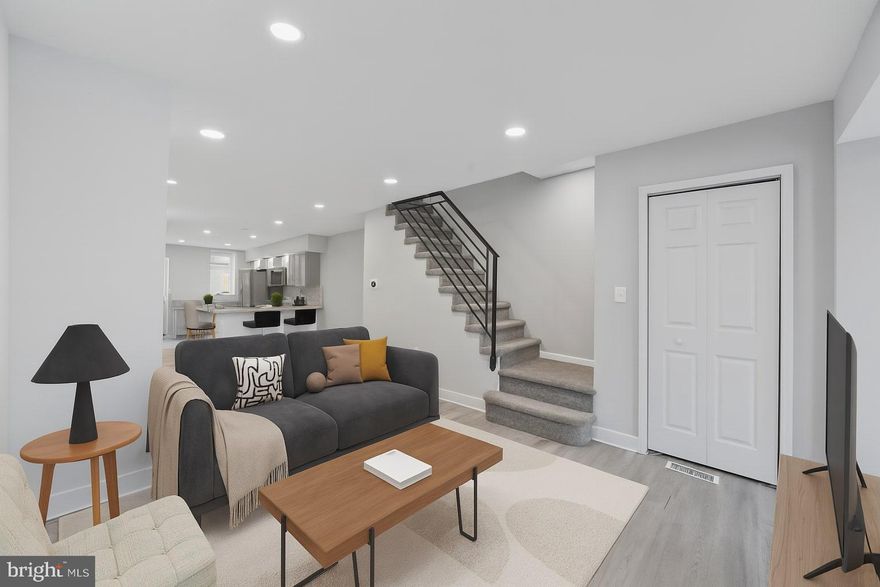 Fully renovated and move-in ready, this beautifully updated home features modern finishes throughout, including an open-concept layout, sleek iron railings, wide-plank flooring, and a stylish kitchen with brand-new stainless steel appliances, granite countertops, and shaker-style cabinetry. The basement offers clean storage space and a full laundry area, while upstairs includes spacious bedrooms, a tiled bathroom with a skylight, and great natural light. Out back, enjoy a brand-new deck and private yard perfect for relaxing or entertaining. Ideally located just off I-95, you're minutes from Center City’s business district and cultural destinations, and close to all the energy and attractions along Richmond Street, Fishtown, and Northern Liberties—known for their top-rated restaurants, bars, cafes, galleries, and boutique shopping. With public transit, parks, and everyday conveniences nearby, this is a prime opportunity for both homeowners and investors looking for value and lifestyle. Some photos are virtually staged.