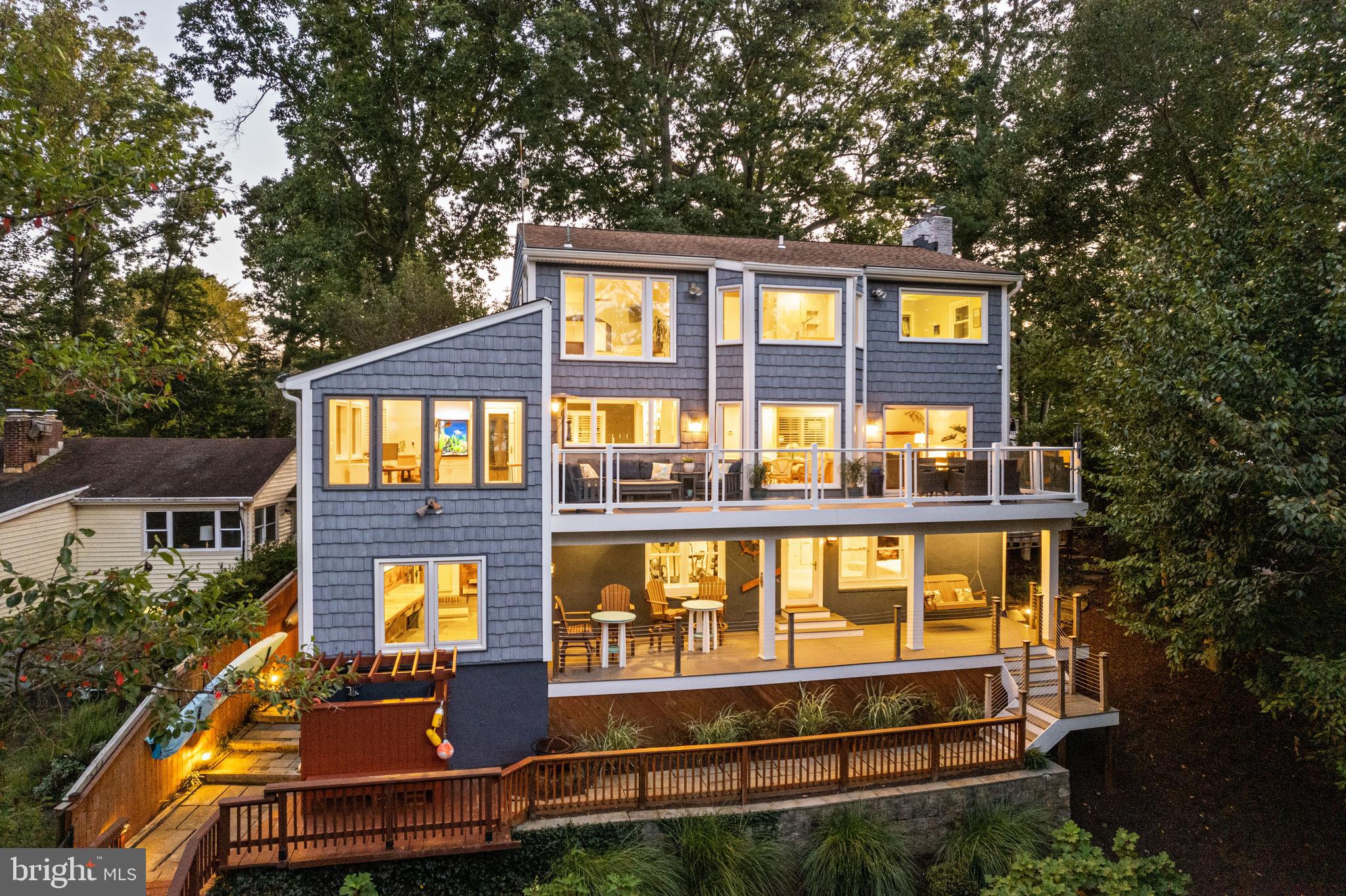 Charming deep water home on Chase Creek in Winchester-on-the-Severn. Over 3,200 sqft of living space spread across 3 levels with walls of glass to capture the serene water views. Open bright interior, totally renovated kitchen and 4 ultra luxe baths. Deep water pier with 50' slip, 20,000 boat lift, PWC lift & 50 amp shore power. To many upgrades to list including: Architectural shingle roof, Paver drwy, 20KW Generator, Outdoor shower, Sauna, (2) waterside composite decks, custom landscaping, lighting and terracing. Just minutes to Rt. 50 and downtown Annapolis. Winchester-on-the-Severn is a fabulous community with public water, natural gas and THE best private beach on the Severn River. The community amenities are second to none, including a boat ramp, (4) piers, marina, beach pavilion, playground, and dog beach, plus the Chase Creek swim club and the B&A Trail is right up the street. Located in the Blue-Ribbon Broadneck School district and just 5 miles to downtown Annapolis and Severna Park. Convenient to Baltimore, BWI, Ft. Meade/NSA and Washington, DC., the location provides the very best this region has to offer in a 30-mile radius. If you are looking for a truly unique property with stunning water views and a great neighborhood setting, this is one opportunity you don't want to miss!