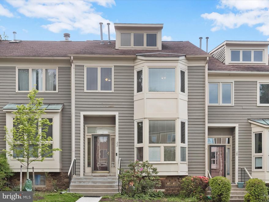 **OFFER DEADLINE: MONDAU May 12th at 12:00pm** Welcome home to this four bedroom, three full and one half bathroom townhome tucked away in the highly sought-after Summit Chase neighborhood. Inside, the eat-in kitchen features stainless steel appliances, granite countertops, a pantry, recessed lighting, and a breakfast nook with a bay window. Hardwood floors and high ceilings create an open, inviting atmosphere throughout the main level. The living and dining rooms flow together in an open-concept layout accented by crown molding and access to the rear deck. A convenient half bathroom finishes this level. Upstairs, the primary bedroom suite impresses with a soaring vaulted ceiling and a private loft that is ideal for a home office or lounge. The updated en-suite bathroom showcases a beautiful walk-in shower, dual vanity, and a vaulted ceiling with skylight. Multiple closets, including a walk-in, complete the suite. Two additional bedrooms upstairs share a second full bathroom with a tub-shower and dual-sink vanity. Downstairs, the finished lower level provides additional living space with a family room that features a cozy wood-burning fireplace, a wet bar, and walk-out access to the patio. The fourth bedroom has an adjacent full bathroom, offering additional privacy. Rounding out the lower level is a laundry room and storage. Enjoy the Summit Chase community amenities, including an outdoor pool with a separate kiddie pool, tennis and pickleball courts, and a clubhouse. Located in a fantastic location with quick access to I-695 and I-83, you will find everything you need just around the corner. Some images have been virtually staged.