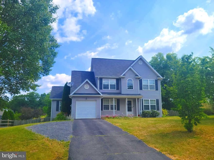 ACCEPTING BACKUP OFFERS! Welcome home to your new country oasis in the much-loved and highly-sought-after neighborhood of Mills Farm! With great neighbors to the front and sides and beautiful open farmland to the rear, this is a home you'll treasure for years to come! This home, boasting over 2200 square feet, has something for everyone, whether the young ones are enjoying the playground up the street or if you prefer the peace and tranquility of the private fenced backyard. Outside, the roof is only 2 years old, the landscaping is nicely matured, and there is a level pad where an above ground pool once stood that could be repurposed for a new pool or another creative idea. Inside the home, a colorful and happy paint scheme awaits you. The kitchen was very recently refreshed with new granite countertops and offers loads of cabinet space, a separate built-in coffee bar, and a walk-in pantry. The living room is an open concept with the kitchen and features an electric fireplace where once a gas fireplace existed (the gas hookup remains in place should you ever want to convert back). There is also an entry level bedroom and full bathroom. The entire main floor has been recently refloored with solid surface flooring. Upstairs, the flooring is brand new and greets you at the top of the stairs. Every bedroom, bathroom, and common room in the home has solid surface flooring. The home also offers dual zone HVAC and a water softener. What's not to love? Schedule your appointment to see this home today! IF YOU LIKE WHAT YOU SEE, CALL     !!!!!