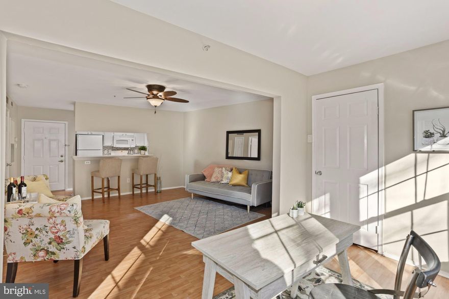 PRICE IMPROVEMENT!!! Sunny, low-maintenance and contemporary living all set within a sought-after gated community!!! Spacious and sun filled (facing East) 1 bed/1 bath PLUS DEN beautifully updated with fresh paint and new white granite countertops. Whether you're cooking an intimate dinner for two or a gourmet feast for friends, you're sure to love the all white kitchen with new granite counters, ample cabinetry and open concept living; perfect for entertaining! Spread out in the large bedroom with walk-in closet, and don't forget your in-unit washer and dryer for added convenience. Enjoy your morning coffee in your sun room with large storage closet or host guests in absolute comfort. This room makes a great office, yoga room, den, reading room, dining room or add French doors and make it a nursery or guest room. One assigned garage parking space and one visitor pass. Gated community with amenities galore include: pool, hot tub, sauna, fitness center, community/party room, dog park, basketball court, grilling/picnic stations, playground, car washing station and daily shuttle to the Pentagon City Metro (M-F every half hour from 6:30-9:30am and 4:30-7:30pm) Walking distance to Shirlington, XSport, and the newly built Silver Diner and Harris Teeter coming soon. One mile from the Bradley Center and Bailey?s Crossroads for all your shopping needs! Community is welcoming, social, and VERY pet friendly!