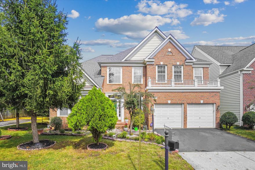 Welcome to this stunning updated brick-front Colonial sited on a desirable premium large corner lot in the sought-after Village at Lorton Valley community. This 4 BR plus a large basement bedroom/den,  4.5 Bath, 2-car garage stately single-family home has it all! Location is gold within minutes to major commuter routes I-95, VRE, Springfield Metro, Route 123 and Ft Belvoir. **Many updates include *NEW ROOF (2021) NEW LEAF/ GUTTER GUARD (2021) *NEW HARDWOOD FLOORS (2017 & 2023) *NEW WASHER (2023) *NEW GRANITE KITCHEN COUNTERTOPS (2023) NEW SS SINK & FAUCET (2023) *NEW GE REFRIGERATOR (2022) *FRESHLY REFINISHED DECK *NEW WATER HEATER (2017) *NEW VANITY TOP in 4th FULL BATH and more. 

**This beautiful home offers an open, comfortable upgraded floor plan with 3 ft extension all the way from the basement to the top floor. Come home to a spacious home with nearly 4000 sq ft on 3 fully finished levels. The ML features gleaming hardwood floors with abundant natural light. As you walk into this cozy home, the original owners' pride shows through. You're greeted by a *2-story foyer, neutral paint, and neutral custom-made window treatments. The kitchen features *Brand New Granite Countertops, *New SS Sink & faucet, Double Oven (bonus for baking enthusiasts) & an *Eat-in Area with access to the *Large Deck, perfect for entertaining/ barbequing with friends & family. Start the day on the deck, soaking- in the morning sunlight with a cup of coffee surrounded by your very own fig, crepe myrtle trees, and colorful flower beds. The kitchen overlooks the spacious family room offering a wall of windows & a *cozy Double- Sided Gas Fireplace. This home caters to the modern needs of working from home with a dedicated private Library on the main level. Separate Laundry Room, Powder room, Formal Living, Dining room, Home Security system & 2-car garage with upgraded side door option complete the ML. The additional set of stairs from the Family Room conveniently takes you upstairs.

**The upper level offers *4 generously sized bedrooms and *3 full baths. The Master Suite features *Tray Ceiling, a spacious Walk-in Closet, large Master Bath with a *Soak-in Tub, a *Separate Shower & toilet & double sinks. *Large Kid's Bedroom has a Full Bath Ensuite & an additional Walk-in Closet. 

**The lower Walk-Up/ Out Basement level with a separate entrance is an entertainer's delight with *a large recreational area. The large bonus Basement Bedroom/ Den/ Guest Suite with a Closet, and a full Bathroom & 2 additional closets make it the perfect space for guests, teens or short-term rentals.

**The Low HOA fees include wonderful community amenities of Village at Lorton Valley with an outdoor *Pool, *Sports Courts, Fully Equipped *Fitness Club, Club House, *Party room, Several Kids' *Playgrounds *Desirable South County High School pyramid, and excellent location within minutes to I-95 (approx 5 min), VRE, Springfield Metro, Amtrak, Fort Belvoir, Lorton Town Center, Lorton MarketPlace, Amazon Fresh, Gunston Plaza, Liberty Market, Multiple Walking & Biking Trails, Golf Courses, Shopping & Restaurants. **This home has so much to offer. Don't let this lovely home pass you by! Schedule a showing today! Welcome Home!"