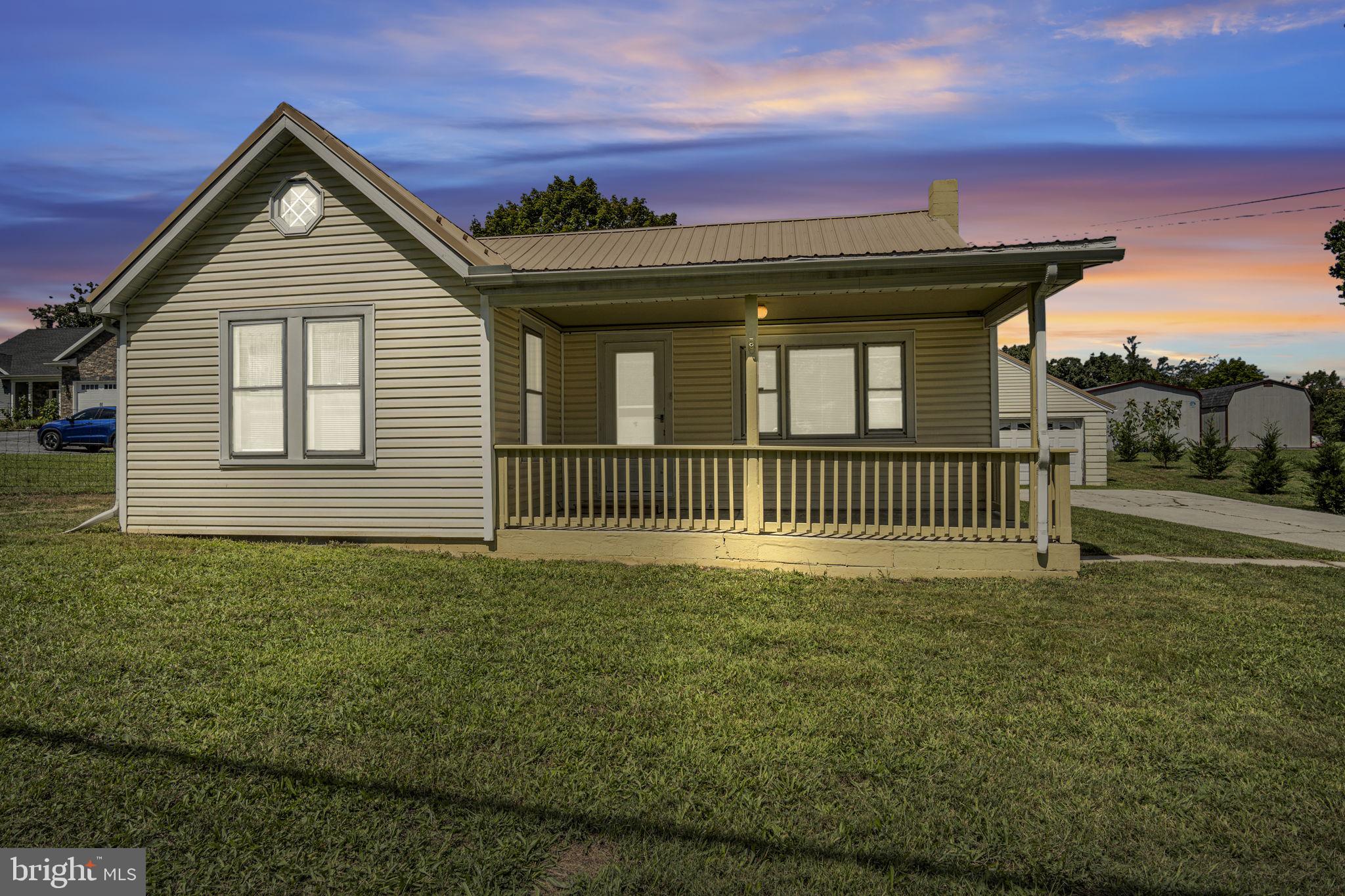 Charming 2-Bedroom Home with Room to Grow!
This 2-bedroom, 1-bath home offers plenty of charm, character, and opportunity for expansion. With hardwood floors throughout (some covered in linoleum), the main level provides a solid foundation for your personal touches. Fresh paint has been completed this year on all baseboards, walls, ceilings, and doors on the first floor, giving the space a bright, refreshed look.
The home features a convenient first-floor laundry room with additional hookups in the basement. Recent updates include new receptacles, light switches, and GFCI protection in both the kitchen and bathroom. No appliances convey, giving buyers the perfect opportunity to choose and install the stove, refrigerator, and other appliances they prefer. The stove connection is versatile—ready for electric or propane use (no tank currently on site). From the driveway, a ramp leads to the rear deck entrance, making access easy.
Head downstairs and enjoy a game of pool on the Brunswick pool table, which conveys with the sale. The basement also offers plenty of potential to finish for extra living space. Upstairs, the second floor was previously used as two bedrooms and could easily be reimagined as additional sleeping areas and a bathroom, or a family room.
The home is equipped with a durable metal roof on both the house and garage (approximately 8 years old). Outside, the blacktop driveway leads into a concrete area and a detached 2-car garage featuring decorative block walls, 220 wiring, insulated Wayne Dalton doors, and a full-size attic above with tongue-and-groove flooring. The garage even includes a block chimney with a woodstove hookup, offering great storage and workshop space.
Located just 9 miles from Hagerstown, 7 miles to the airport, and 8 miles from downtown Greencastle, this property combines peaceful country living with convenient access to town. And for winter fun, you can even see White Tail Ski Resort lit up from the property—just 9 miles away!
With a little TLC, this home is ideal for buyers who need extra space and want the opportunity to create their dream living areas.
Property is being sold "as is". Any inspections are for buyers knowledge only.
The seller is having the property surveyed to locate identify and mark the boundary pins.
Seller, as Executor of the estate, will transfer the property by Fiduciary Deed, and any Agreement of Sale must state that conveyance will be made by Fiduciary Deed rather than by Special Warranty Deed.
The listing agent has a personal relationship with the seller, who serves as executor of the estate.