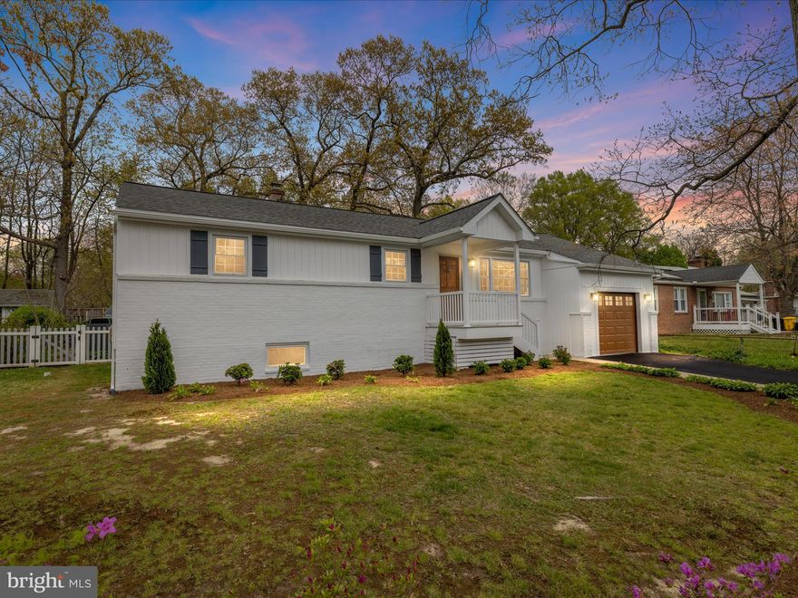 THIS STUNNING RENOVATION IS PRICED TO SELL, AND THE SELLER IS READY TO MAKE A DEAL — DON’T MISS YOUR CHANCE TO OWN THIS EXCEPTIONAL HOME! Fully renovated, move-in ready, and packed with style — Why settle when you can have it all? This home has been completely reimagined with care and purpose. The curb appeal speaks for itself, thanks to a freshly sealed blacktop driveway and a newly added front portico, which adds charm and shelter. Major exterior upgrades include a new roof, siding, gutters, downspouts, fascia, and soffits — offering peace of mind for years to come.
Inside, the transformation continues with all-new luxury vinyl plank flooring, brand-new contemporary lighting throughout, and an improved floorplan. The beautifully updated kitchen is the heart of the home and features quartz countertops, GE stainless appliances, and soft-close drawers and cabinets. It opens to a bright and spacious family room where a wood-burning fireplace, exposed beam ceilings and cheerful bay window create the perfect spot to gather, relax, or entertain.
Bedrooms are generously sized, and the main-level primary suite includes a walk-in closet and en suite bath. Baths have been fully refreshed with classic subway tile, new cabinetry, and updated fixtures for a look that’s modern yet timeless. Most of the windows have been replaced with new vinyl for energy efficiency and comfort. A brand-new staircase off the living room now leads to a fully usable bonus space — ideal for a home office or creative studio.
The lower level adds even more space and flexibility with a large finished rec room — made for game days and movie nights — custom built-ins, a wet bar, beverage fridge, and a private third bedroom with its own en suite bath. There's even potential for a separate entrance via the garage, making this an exceptional option for multi-generational households or rental potential. Out back, a freshly sodded lawn and privacy fence create an outdoor retreat. A separate laundry room just off the kitchen keeps daily life running smoothly, and the single-bay garage adds convenience and storage. Great location for easy access to local shopping and dining plus DC and Baltimore commuter corridors.