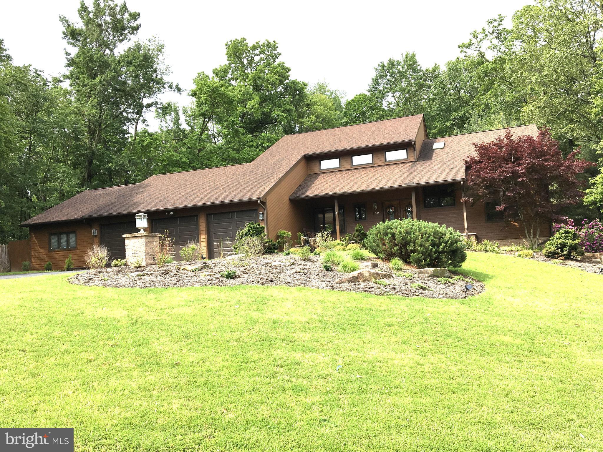 Beautiful Contemporay Style Home , waiting for its new owners. Four bedrooms and three and half baths, full finished basement. Two gas fireplaces, with heat pump has propane back-up heating, central air, large generator included in case of power outages. Large heated workshop recently added to attached garage Inground salt water pool. Lovely landscaping, just a minute to walking trails. Close to downtown Bedford and the Omni .
