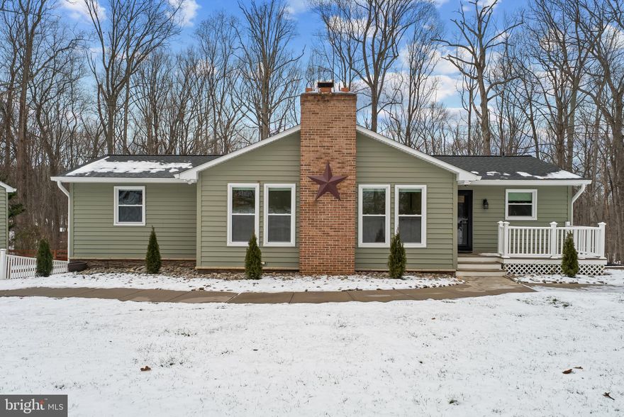 Tucked away on 3.5 serene, tree-lined acres, 1800 Pine Knob Road offers the perfect
blend of privacy, luxury, and modern comfort just minutes from the heart of Sykesville
and Eldersburg. This stunning retreat welcomes you with a long private driveway, lush
landscaping, and a detached three-car garage.
A charming stone walkway and river-rock hardscape lead you to the front entrance,
where you’ll step into a light-filled interior showcasing rich Brazilian cherry floors and
expansive floor-to-ceiling windows framing breathtaking views of the surrounding
nature. The spacious family room, anchored by a brick fireplace, creates a warm and
inviting gathering space.
The main level features a luxurious primary suite complete with a custom closet and a
fully renovated spa-inspired bath with soaking tub, double vanity, and oversized stone
shower. An additional bedroom and beautifully updated full bath offer comfort and
flexibility for guests or family.
At the heart of the home is the fully renovated (2026) kitchen, featuring custom
Omega cabinetry, induction cooktop, wall oven and microwave combo, luxury sink and
faucet, and premium appliances—perfect for both everyday living and entertaining. Step
through the custom Pella patio door onto the rear deck and take in the peaceful views of
your private backyard.
The fully finished walk-out lower level adds even more living space with two additional
bedrooms, a full bath, and a large recreation area—ideal for guests, a home office, or
extended living. Major system upgrades including new HVAC, water heaters, well
system, radon system, and electrical panel provide peace of mind.
Outside, enjoy your own slice of paradise with a fenced yard, patio, decks, and a
tranquil, wooded backdrop—perfect for morning coffee, evening gatherings, or simply
unwinding in nature.