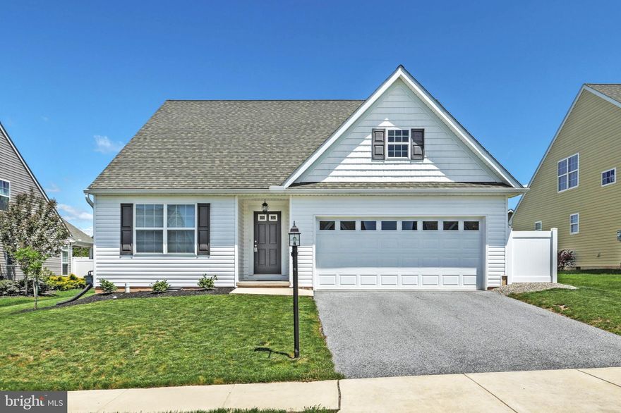 Move-in ready home in Northeastern Schools. If you are looking for easy and beautiful first floor living, then this is the home for you! Home shows like NEW, Featuring a great open floor plan with hardwood flooring throughout, gas FP, granite counters, vaulted ceiling in LR, master suite with private bath & walk-in closet, 3 BR's, 3 full baths, laundry, SS appl. including fridge and so much more.