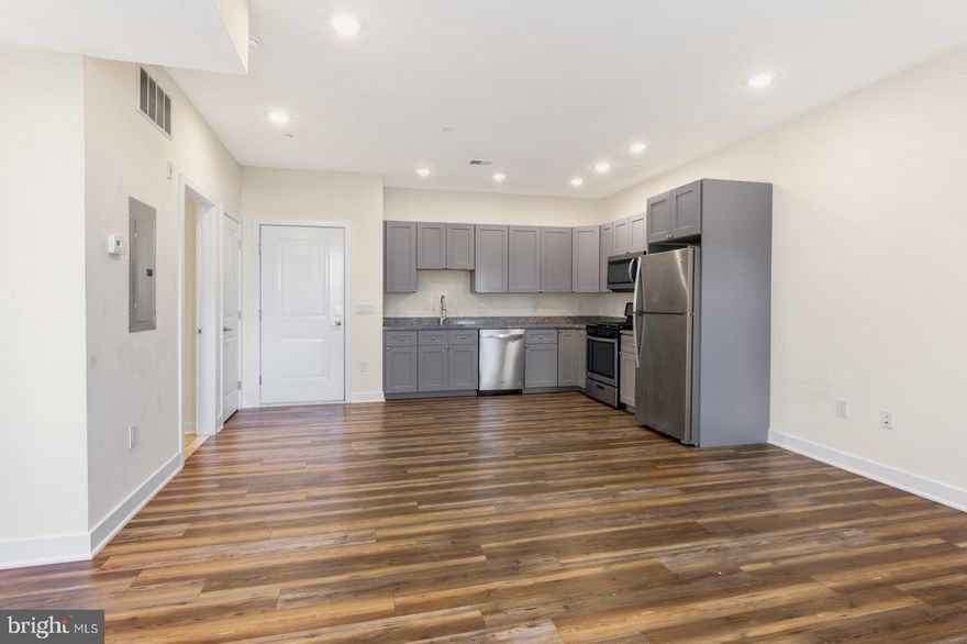 Available NOW | Leasing Special: 1 MONTH FREE on a 12-month lease. 1 month free to be applied as a monthly discount over the lease term. Gross rent: $1,275/month, Net effective rent: $1,168/month. Tenants pay the net rent monthly.

Welcome to the Boston Street Flats! 2411 Kensington Ave #209 is a stunning 1 bedroom 2nd floor apartment in a professionally managed rental building with modern amenities. The common area greets you with hardwood floors, natural sunlight and recessed lighting. The open floor plan offers versatile options for furniture placement and an airy atmosphere. To the back is your gorgeous L-shaped kitchen, equipped with gray soft-close cabinets, granite countertops, and a suite of sleek stainless steel appliances. Conveniently located in a closet is the stacked laundry. The full bathroom showcases a lighted granite-topped vanity and a full-size bathtub/shower. Elevate your living experience by stepping out to the private balcony, an ideal retreat during the warmer seasons. Building amenities include a secure lobby with a dedicated package room and elevator for added peace of mind. Enjoy a breathtaking common green roof, offering panoramic 360-degree city views. Fitness enthusiasts will appreciate the basement-level gym while cyclists have access to a spacious bike room. There’s a superintendent on site, a vending machine, and 1 dedicated storage cage per unit (included in the rent) in the basement. Secure off-street parking, when available, is an additional $125/month.

Please note: photos & video tour are from a similar unit within the building; exact finishes & layouts may vary.

Lease Terms:

Generally, first month, last month, and one month security deposit due at, or prior to, lease signing. Other terms may be required by Landlord. $55 application fee per applicant. Pets 40 lbs and under are conditional on owner’s approval and may require an additional fee and/or monthly pet rent, if accepted. (Generally, $500/dog and $250/cat, and/or monthly pet rent). Tenants responsible for: electricity, gas, cable/internet, and a $50/month flat water fee. Off-street parking, when available, is an additional $125/month. Tenants will have the option of either using Verizon Fios or Comcast for telephone/cable. Landlord Requirements: Applicants to make 3x the monthly rent in verifiable net income, credit history to be considered (i.e. no active collections), no evictions within the past 4 years, and must have a verifiable rental history with on-time rental payments. Exceptions to this criteria may exist under the law and will be considered.