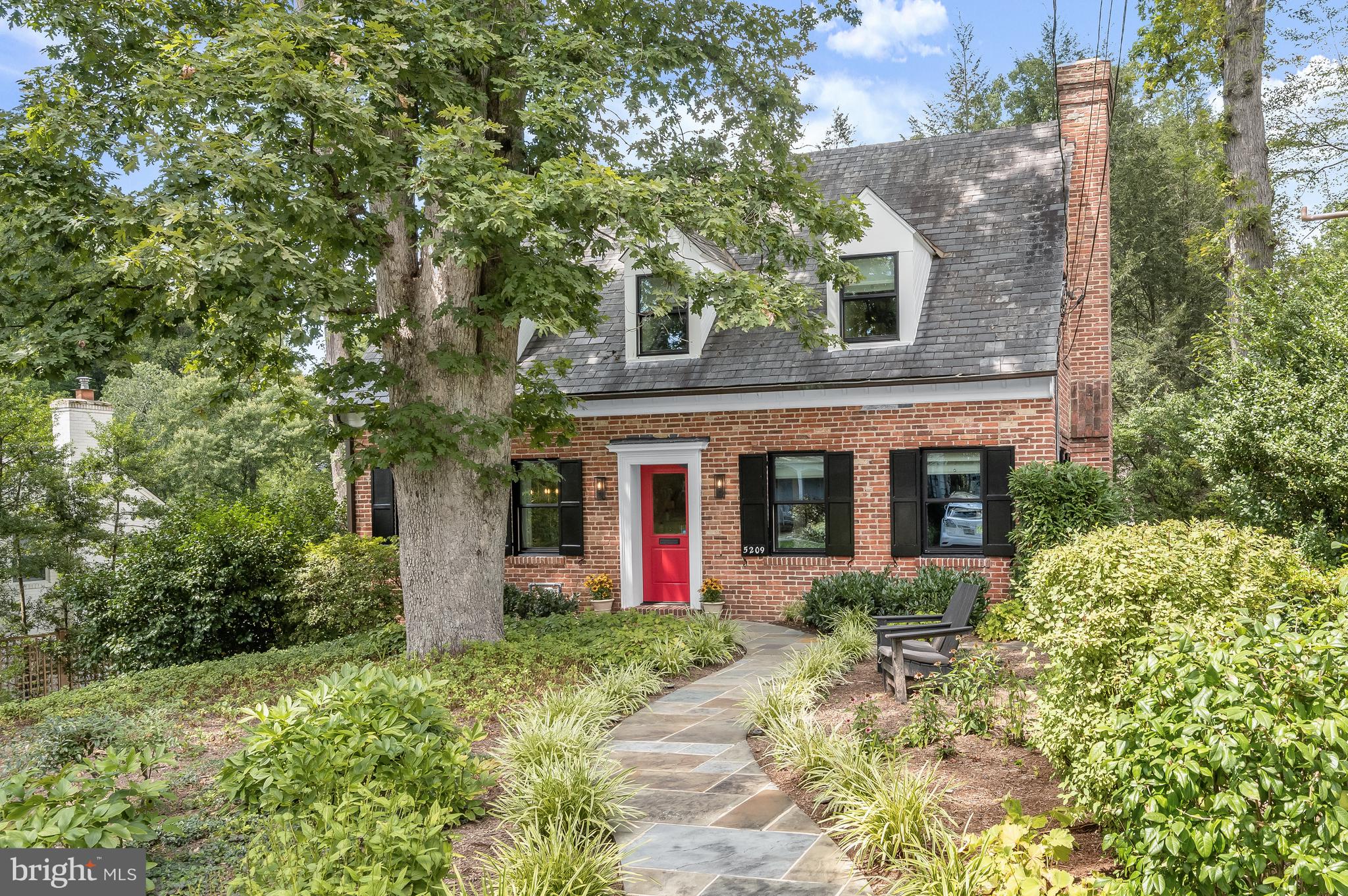 Exquisitely appointed and meticulously maintained this home is located within the verdant enclave of Westmoreland Hills. The traditional floor plan seamlessly blends comfort with elegance featuring refinished wood floors and new windows throughout the home. The foyer opens to a spacious living room where crown moulding and chair railing pair perfectly with the new gas-burning fireplace mantel and large windows. The adjacent family room features custom built-ins and lighting. Elegant and spacious, the recently renovated kitchen is perfectly situated next to the dining room. Stainless steel appliances, including a Wolfe gas range make meal prep a dream. The kitchen opens to the professionally landscaped rear garden and stone patio. An additional room or flex space can serve as an office or sitting room. Gorgeously updated, the main level powder room provides convenience when entertaining.
Two spacious bedrooms reside on the second floor, including a generously proportioned primary suite with a large walk-in closet and custom built-ins. The large hallway bath has been beautifully renovated with a walk-in shower and heated floors. The second bedroom boasts double large European-style closets and custom built-ins. A lovely reading nook with a window seat and built-ins grace the second floor landing. The lower level has been completely renovated with a large open room, half bath, utility room and a one-car garage with a new concrete long driveway.