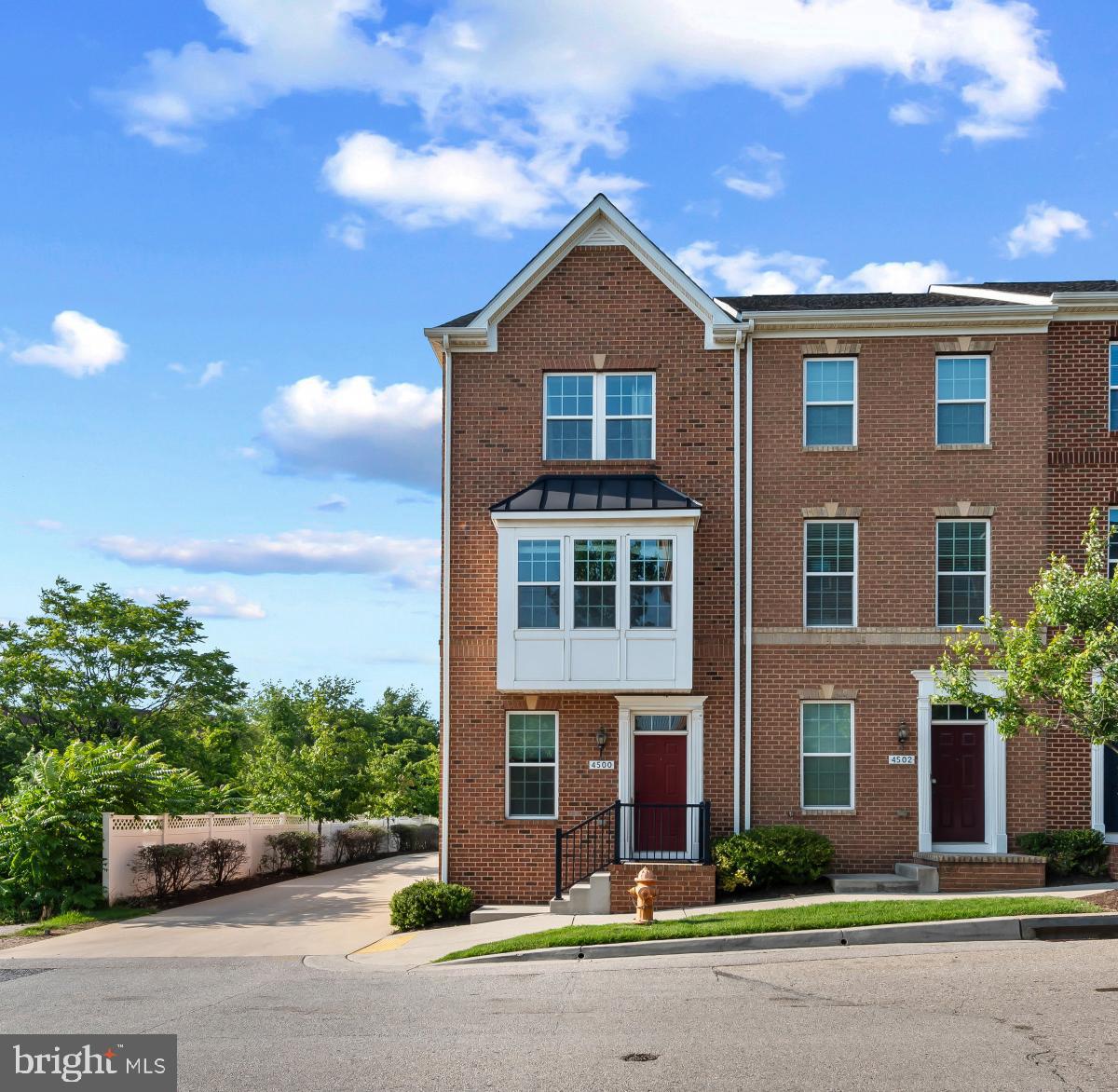 Stylish end-of-row townhouse offering 1,792 square feet, 3 bedrooms, 3 full baths, and a 1-car garage, located in vibrant O’Donnell Square. The entry level features a bedroom with an attached full bath, along with access to the garage. Upstairs, the main level offers a spacious living room with charming bow windows, a dedicated dining area, and a well-appointed eat-in kitchen. The stunning kitchen is outfitted with modern finishes, including a peninsula breakfast bar, stainless steel appliances, mosaic tile backsplash, a center island, a pantry, and access to the rear deck with a privacy wall—perfect for everyday living and entertaining. The top level includes two additional bedrooms and two full bathrooms, including a spacious primary suite with double closets and a spa-inspired ensuite bath featuring a dual sink vanity. A centrally located laundry area adds convenience.
This home qualifies for an Assumable VA Loan!