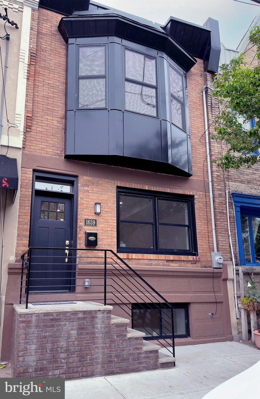 Spectacular, Amazing spacious new custom home. This fully renovated single-family rowhome situated in the highly sought-after Newbold neighborhood of South Philly is a must-see! It features three bedrooms with a possibility of a fourth, and three full bathrooms. The property has been completely redone from top to bottom and comes with a 10-year partial tax abatement. As you enter, you are greeted with an open-concept floor plan with stunning blonde floors, black windows with extra-large window seals, black iron railings, high hats throughout, and all rooms wired for TVs. You will also find a Ring doorbell and the most beautiful kitchen, which features stunning blue cabinets with gold hardware and Samsung appliances, including a gold sink. There is an island and a cozy backyard space that is perfect for entertaining guests. On the second floor,  three spacious bedrooms and two full bathrooms, including a primary bedroom with bay-style windows that allow plenty of natural lighting and an en-suite bathroom with a glass-enclosed stall shower with pebble stone flooring and gold detailing. The basement includes a living room that can also serve as a home office or a private gym, a full bathroom, a laundry area, and a back room that is perfect as a fourth bedroom or provides additional storage. Living at 1639 Jackson St, you are just a short walk to the Broad Street Line, restaurants, and shops in Passyunk Square, all local highways, and the airport. Schedule your showing today!

** This property does not come furnished. ** 2300 SQ FT OF LIVING SPACE