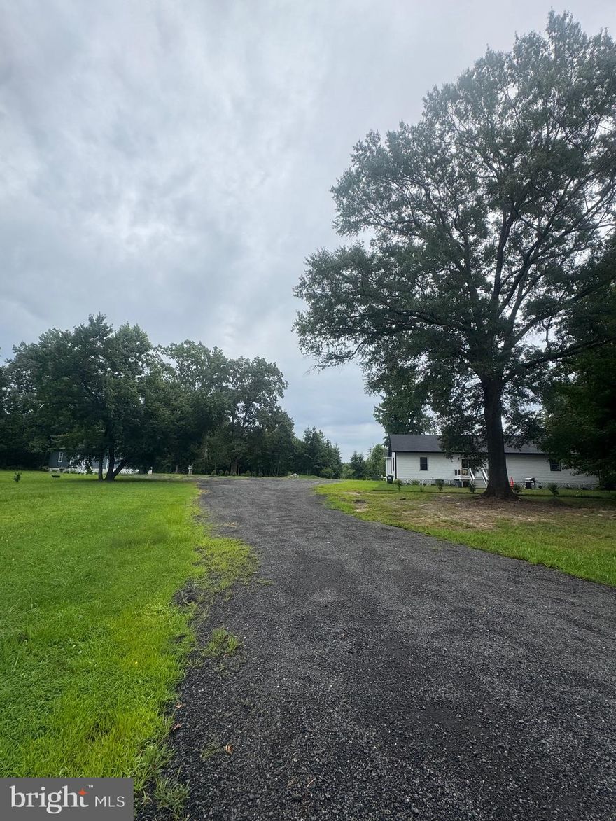 Amazing opportunity to own 3 HOMES ON 20 ACRES WITH POSSIBILITY OF 6 MORE LOTS INCLUDED! Please verify. Priced for quick sale! Newly built homes in 2025, currently Air bnb's.  Call lister with availability to show - by appointment only please.  Beautiful 20 acres (two 10 acre lots) level and open, peacefully surrounded by woods.  Quiet and conveniently tucked away just off Route 1 - just 10 minutes from the new Kalihari Water Park and Dominion Speedway beyond.  Perfect location for a family compound or investment potential is great! Have a farmette or small subdivision.