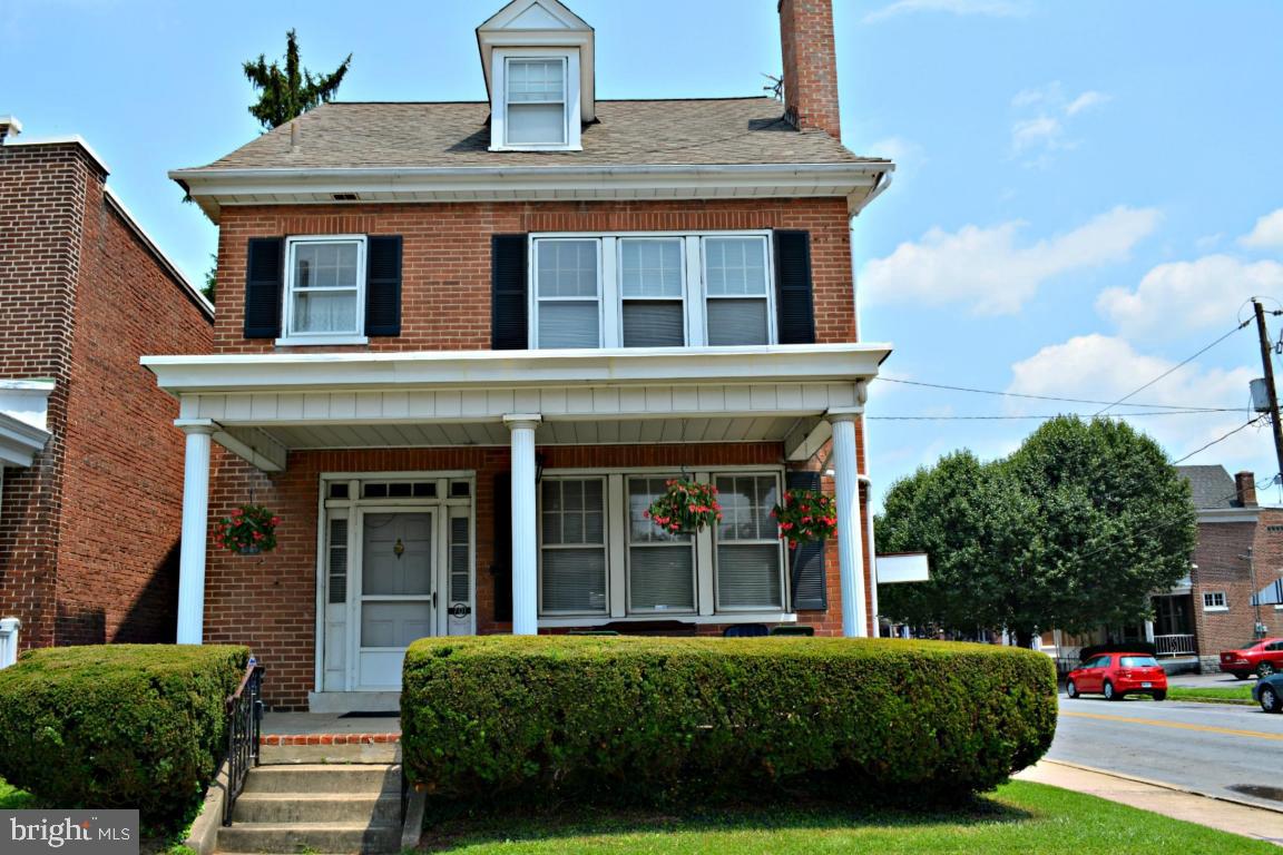 This Stately Brick, 2.5 Story Detached Home has much to offer, Including In-Law Quarters, Central Air & 1 Car Garage! Classic 4 BR features hardwood floors in LR & DR, French doors, gas fireplace & nice built-ins. Wood laminate on 2nd floor. Updated walkout basement w/full kitchen & bath; perfect for extended family or family room! Enjoy the outdoors on the patio, front porch, huge balcony or All Season Rm!Close to everything!