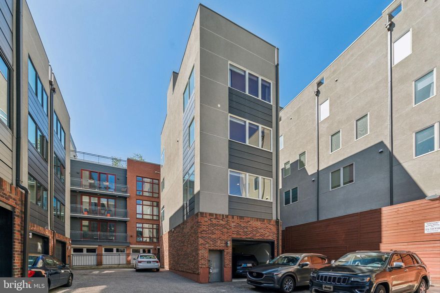 3-CAR PARKING | STANDALONE HOME | ROOF DECK VIEWS FOR DAYS | MCCALL CATCHMENT
Welcome to a true unicorn in the heart of Old City—the only fully detached home in the coveted Fireman’s Place community, offering 3-car parking and unmatched privacy on Quarry Street’s charming cobblestone block. Homes like this rarely come to market. This 3 bed, 3 full bath, 2 half bath residence spans over 2,500 square feet of well-designed living space, flooded with natural light from every direction—a rarity in Philly thanks to no shared walls. Step inside through the private garage or front door into a spacious foyer with a half bathroom and a versatile den/home office. One level up, you'll find a bright and expansive main living floor with oversized living and dining areas, a beautifully upgraded kitchen with shaker cabinets, stainless steel appliances, and a $7,500 custom drawer insert upgrade. The third floor hosts two oversized bedrooms, a hallway full bath, and an en-suite bathroom for Bedroom 2. The entire next level is dedicated to the primary suite, featuring a spa-like bathroom with dual vanities, a massive walk-in closet, and ample space to unwind. The crown jewel of this home is the double-sided roof deck, which was recently gel-coated in 2024 and is perfectly set up for entertaining with an adjacent wet bar. Enjoy unobstructed panoramic views of the Ben Franklin Bridge, Delaware River, and Center City skyline—a Philadelphia trifecta most only dream of.
Additional highlights include double-wide oak plank flooring throughout, a finished basement with abundant storage, and a 10-year tax abatement running through 2026—roughly $15,000 in savings on your tax bill. Located in the highly sought-after McCall School Catchment, this home also offers exceptional long-term upside with the I-95 Capping Project underway.  Don’t miss this once-in-a-decade opportunity to own a truly one-of-a-kind home in the heart of Old City. This standalone stunner checks every box—privacy, parking, space, views, top-tier schools, and incredible investment upside. Property includes one legal parking space (enclosed garage). The HOA’s drive aisle is configured in a way that allows for up to two additional cars to be parked in front of the garage without impeding access for other residents. The seller has routinely parked one to two cars in this area without incident since 2019. Schedule your tour before it's gone!