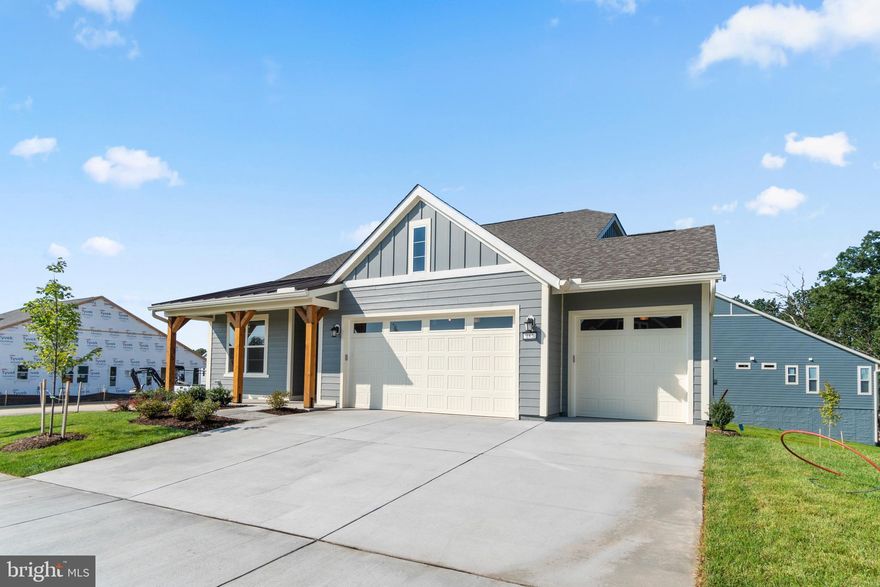 Welcome home to Trilogy at Lake Frederick with this Refresh model with unfinished basement featuring 2 bedrooms, 2 bathrooms, and over 1,900 sqft on the main level. Enjoy upgraded stainless steel appliances, deluxe kitchen cabinets, fireplace in the great room with slate surrounds, luxury vinyl plank flooring on the main floor, frameless heavy glass shower door in the primary bath, 3-car garage, irrigation system, and much more. This is the 55+ community you've been searching to find with incredible amenities that will keep you excited to enjoy every season. Explore the expansive Shenandoah Lodge with its farm-to-table restaurant, ballroom for events, Crow's Nest club for members-only, arts & crafts room, culinary experience room, and so much more. Next door there's even more with the recreation facility featuring an indoor and outdoor pool, exercise equipment, tennis courts, and the list goes on. Ask about Shea Mortgage's closing cost assistance with up to $10,000 in credits. Discover your new home, new adventure, and new Active Adult community in Trilogy at Lake Frederick!