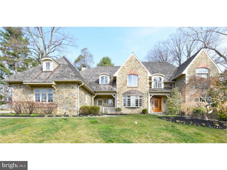 Situated on a quiet, private lane in Villanova, Lower Merion Twp, you'll find this stately, breathtaking stone mansion.  Built in 2005, this 6 Bdrm/7.2 Bath home has every modern amenity complete with old world charm.  First impressions are everything, and the grand traverse Entrance Hall with herringbone hard wood flooring certainly lives up to that.  High-end appointments such as rich custom millwork, tray ceilings and wainscoting are found throughout this special home.  Entertain in the formal Living Room with marble surround gas fireplace, or the formal Dining Room w/ large bow window and separate serving area w/ beautiful built-in china cabinets. Escape to the handsome Library with coffered ceiling, custom built-ins and marble surround gas fp.  The center island Chef's Kitchen with dramatic domed ceiling detail is filled with every convenience for the modern day cook, including 42" custom cabinetry, Subzero, Thermador Professional oven, gas cooktop & warming drawer, 2 Bosch dishwashers, walk-in pantry and so much more.  The Kitchen opens into the  striking Family Room with stone gas fp, and 12-ft vaulted beamed ceiling. Two Powder Rms, Wet bar, and family entry area, back stairway complete the main level. On the 2nd Fl, the magnificent Master Suite features tray ceiling, Sitting Area w/ French doors to Juliette balcony, custom outfitted dressing area w/ window seat & 2 large walk-in closets.  And, it doesn't stop there?luxurious Master Bath with inlaid mosaic natural honed stone flooring, 2 custom vanities, frameless shower and separate water closet.  There are 5 add'l Bedrooms, all En-Suite, all spacious with custom outfitted closets, and all uniquely their own.  The Laundry Rm with Whirlpool Duet washer/dryer & laundry sink is ideally located on the 2nd floor as well.  The 3rd fl offers a fun, creatively decorated Bonus Rm w/ Bath or 6th Bdrm.  The icing on the cake is the fabulous Lower Level with something for everyone: Billiard Rm, wet Bar, climate controlled 400 bottle Wine Room, Rec Rm, Exercise Rm and Home Theater plus storage.  On a summer night, step outside to the flagstone patio with stone fireplace and relax to the sounds of the fountain and koi pond or your favorite music on the outdoor speakers.  Landscape lighting, underground sprinklers. 3 car att Garage. Award Winning Lower Merion Schools and minutes to the train, 76, 476, Main Line shopping and restaurants, 25 min to Center City Phila, 30th St. Station and PHL Airport. A gem!