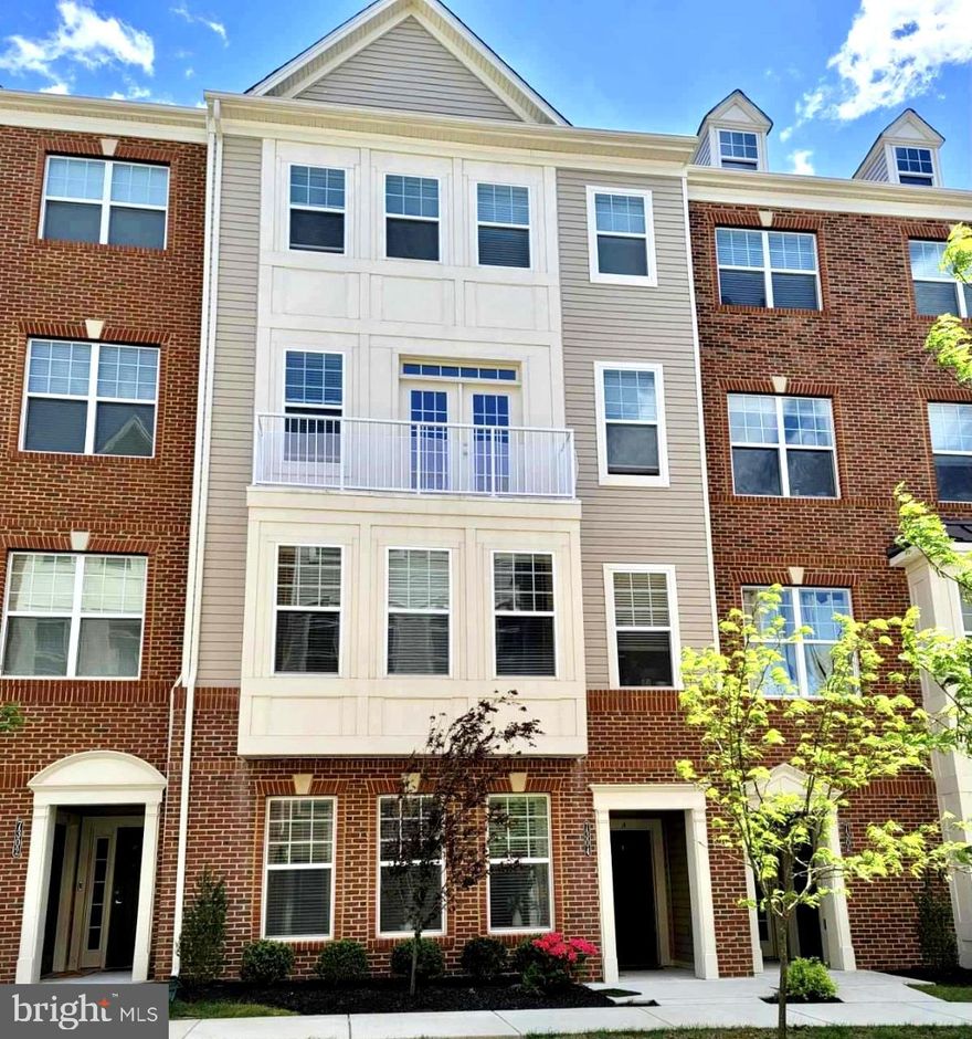 Luxury 2 level condo in sought after Oxford Square in Howard County. Featuring 3 bedrooms, 2 1/2 bathrooms, one-car garage and Private Elevator from the entry level to the main floor and bedroom floor for convenience. Open floor plan main level is Filled with natural lighting through out the house offering, gourmet kitchen with stainless steel appliances, massive granite island and breakfast bar , open to the dining room, living room with French door to the front balcony overlooking open space of the community park and family room with built-in dry bar & access to the back deck. The upper level offers large owner's suite with tray ceiling, large walk-in closet and huge luxury en-suite spa like bathroom with double vanity, separate shower and soaking tub, two secondary bedrooms, full bath and laundry room (washer/dryer excluded) off the hallway. Community amenities include a club house, fitness center and outdoor pool. Conveniently located near Baltimore, DC, Fort Meade, BWI and major commuting routes I-95, 295, 100, shopping, dining and entertainments.