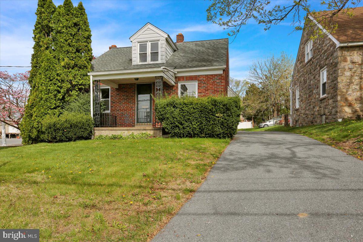 This single detached brick Cape Cod was originally a home, but for many years has been used as a commercial office. To convert it back to a residence, you will need to add a kitchen and tub or shower to the main floor half bath. There is ample space for a tub or shower. In addition to the first floor half bath, there is a second half bath in the basement, which also has two rooms with new carpeting. The second floor of the home is one huge bedroom. Other features include natural gas heat, central air, covered back porch, off street parking for 3 or more vehicles, and a 1 car detached garage .