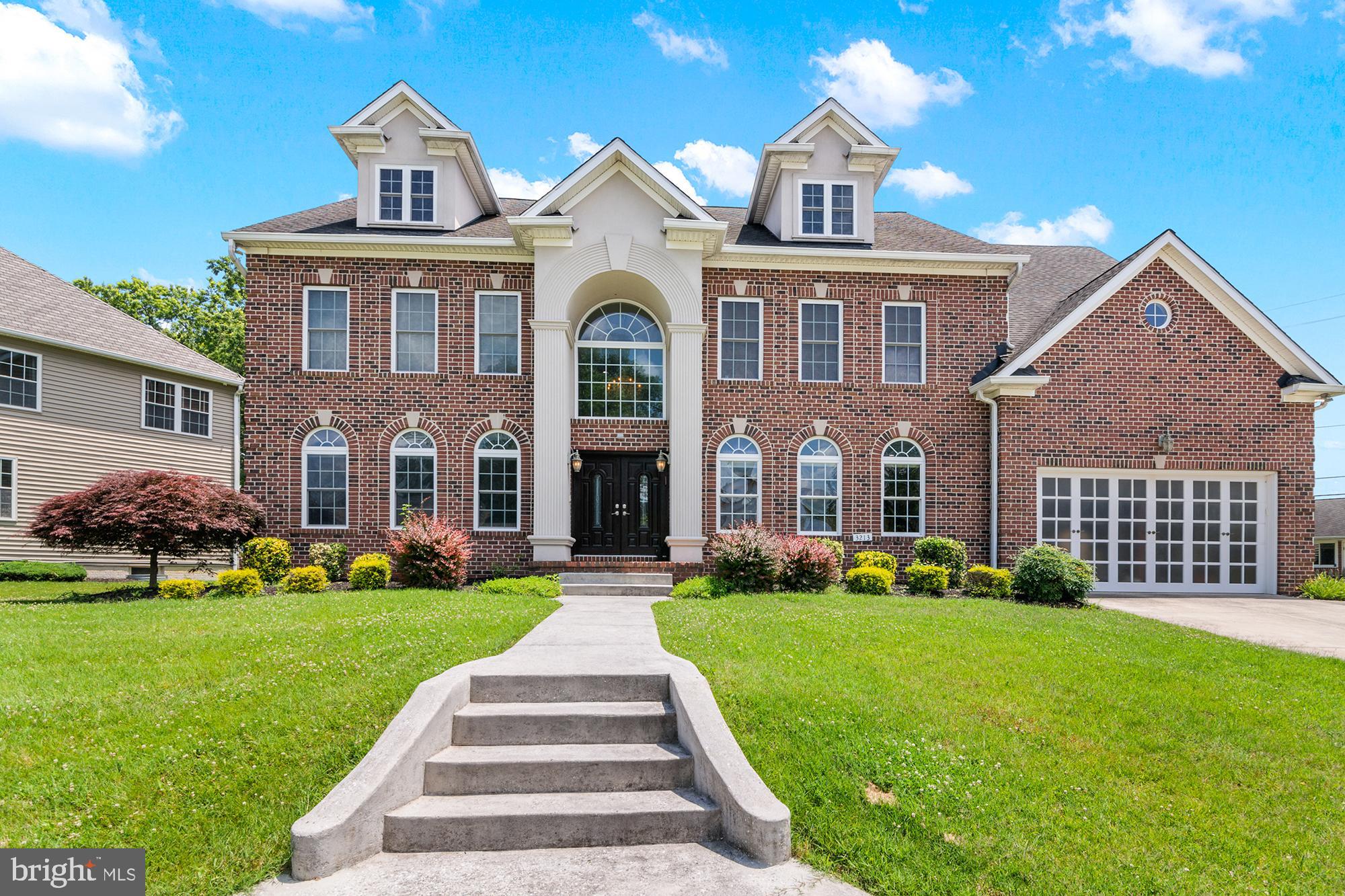 Welcome to this exquisite 6-bedroom, 4.5-bath Colonial, boasting over 6,000 square feet of meticulously crafted living space. Built in 2008 and nestled in a highly desirable Pikesville neighborhood, this property is a true gem offering comfort, sophistication, and space for the entire family.
Main Level highlights include- breathtaking entryway with soaring ceilings, elegant curved staircase, custom mosaic floor with a dazzling crystal chandelier, a formal dining room with rich wainscoting, crown molding, medallion ceiling, and its own crystal chandelier, an expansive living room perfect for entertaining or relaxing. A gourmet chef’s kitchen featuring stunning granite countertops and custom wood cabinetry, ceramic tile floors and massive center island with an under-the-counter microwave and oven, 2 sinks, 2 dishwashers, state-of-the-art appliances including gas Wolf range, a Sub-Zero paneled refrigerator and a separate Sub-Zero paneled freezer, Butler’s pantry with additional cabinetry and sink, 2 large walk-in pantries and breakfast area with access to a maintenance-free deck and patio, Family room with cozy gas fireplace and adjacent powder room, mudroom with side entry and direct access to 2-car garage equipped with Tesla charger, and a guest suite with private full bath. Upper level includes double-door entry to the luxurious primary suite featuring a spacious sitting area, 2 large walk-in closets, Spa-inspired en-suite bathroom with jacuzzi tub, glass walk-in shower, dual vanities, walk-in linen closet, and private toilet with bidet. Upper level also features additional generously sized bedrooms (one currently used as an office), 2 full hall bathrooms and an open hallway with sitting area, a convenient upper-level laundry room with washer and dryer, and staircase access to full-size attic with roughed-in flooring, windows, and balcony access. The Lower level features a full-size, unfinished basement with 10-ft ceilings, plumbing rough-ins, and French doors leading to walk-out stairs to backyard oasis with deck, patio, and a charming children’s playhouse. Exterior front includes beautiful landscaping and an oversized driveway for more parking. Additional highlights include high-end Santos Mahogany hardwood floors, custom crown molding, recessed lighting throughout, large windows offering abundant natural light, dual-zone HVAC system (one unit replaced in 2024) and 400-amp electrical service. This custom designed home is a rare find—perfect for families, entertaining, and enjoying luxury at every turn. Impossible to replicate at this price with today's construction costs. Don’t miss the opportunity to make this dream home yours!