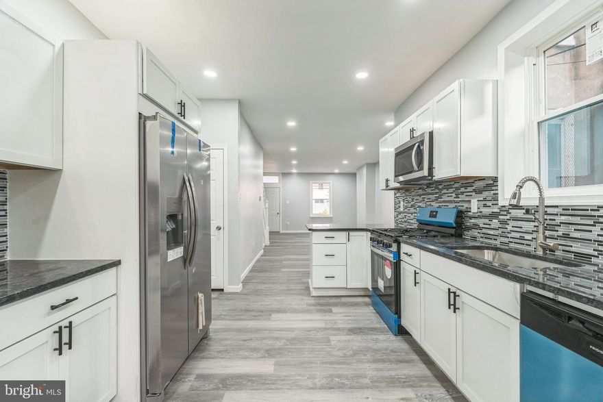 Turnkey ready for you to move in. 
This house qualifies for up to $20,000 grant program! what are you waiting for!
Enter this fully renovated townhome from the patio that is welcoming,  leading you through the insulated front door to an open concept living/dining area. This  leads  to a contemporary design kitchen with windows with brand new stainless steel energy efficient appliances including built in microwave, stove, dishwasher and double door fridge. There are new kitchen cabinets with modern design drawers and granite countertop. Well coordinated colored backsplash adds its own unique beauty to the kitchen
The ceiling is beautifully arrayed with recess lights that enhances the lighting in the room. The stainless steel kitchen sink comes with garbage disposal. The kitchen leads to a cozy step down backyard through this nice french door.
There are 3 beautiful bedrooms up stairs  each with ceiling fans; the primary room has bay windows. There is a brand new hallway bathroom with shower and nice bathroom enclosure. There is a nicely positioned vanity with cabinet, beautiful wall mirror and contemporary lighting. 
The basement can be accessed from the kitchen. The basement is a place to bring your ideas for utilization, suitable for various  usage. There is a brand new set of washer and matching dryer in the basement, (electric).
There is a plumbing ready for additional 1/2 bath in the basement if needed.
This house has central air conditioning system. The Security cameras are installed and transferable to new owners for your security services.
Schedule your showing appointment today!
House qualifies for up  grant program , check it out today