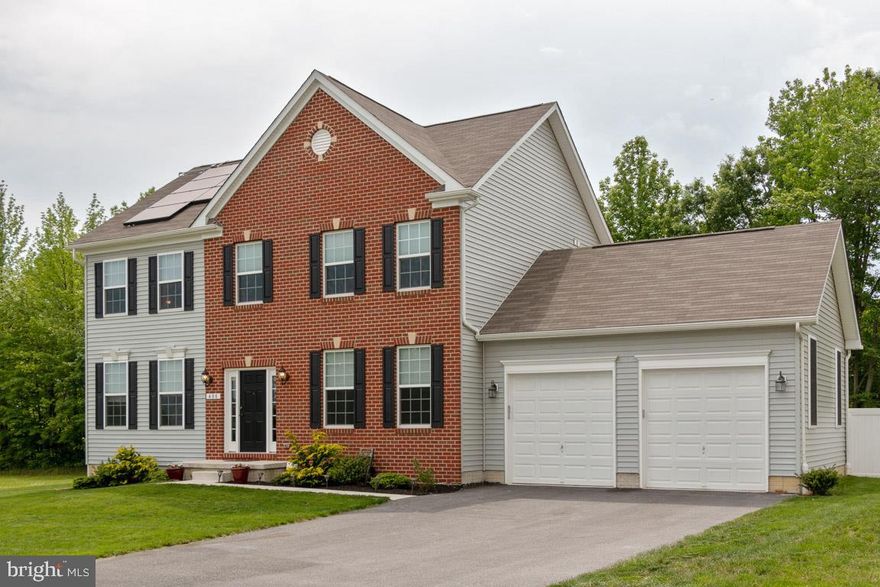 2 Year old, Brick front, 4 bedroom, 2 1/2 bath colonial located in the popular Rogers Addition community.  Home features a wonderful gourmet kitchen with open floor plan to breakfast room and family room with fireplace.  A formal living room, dining room and powder room complete the first floor.  4 bedrooms, (Master is 21x16), 2 full baths and laundry facilities are upstairs. There is a clubroom in the lowest level and rough in for another full bath.  And, this 'like new' home sits on very low traveled, court location. Call Walt today for an appointment.  (Check out the photos under the 'Tour" button.)