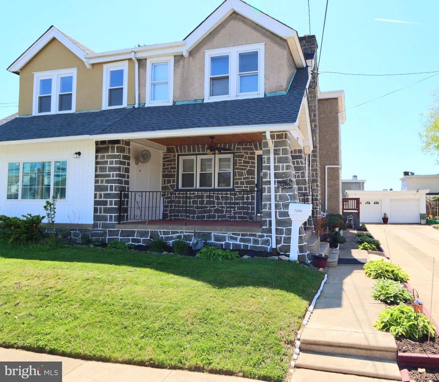 Welcome to 7206 Spruce Street, a beautifully maintained twin home located in the heart of Upper Darby offering the perfect combination of charm, modern updates, outdoor space, and commuter convenience. This move-in ready home has been thoughtfully upgraded throughout and is ideal for homeowners looking for comfort, style, and accessibility just minutes from Philadelphia.  From the moment you arrive, you will appreciate the attractive stone exterior, covered front porch, manicured landscaping, long private driveway, detached garage, and two off-street parking spaces. Inside, the home features beautiful hardwood floors, an inviting fireplace, spacious living areas, and a bright sunroom that adds additional flexibility for entertaining, relaxing, or working from home.  The updated kitchen offers both functionality and style with granite countertops, stainless steel appliances, custom cabinetry, tile backsplash, oversized sink, and an impressive 36-inch commercial-grade gas range perfect for cooking enthusiasts. Additional upgrades include mini-split AC and heating systems, 220-volt electric service, smart lock technology, smart video doorbell, motion sensor driveway lighting, and a 3-camera home security system for added peace of mind.  The finished basement provides valuable additional living space ideal for a media room, gym, office, guest area/in-law suite, or recreation room. Outside, enjoy a large gated backyard perfect for gatherings, pets, gardening, or summer entertaining.  Conveniently located near major public transportation routes including SEPTA bus, trolley, and regional rail lines, this home offers easy access to Center City, University City, and surrounding suburbs. Commuters and medical professionals will appreciate the close proximity to University of Pennsylvania, Drexel University, Children's Hospital of Philadelphia, Penn Medicine, and other major hospitals and employment centers. Less than 2 miles from the "NEW" Cobbs Creek Golf Course with nearby shopping, restaurants, parks, schools, and entertainment make this location even more desirable.  If you have been searching for a well-maintained, updated, move-in condition home with parking, outdoor space, smart features, and excellent accessibility, 7206 Spruce Street is a must-see property that stands out from the competition.