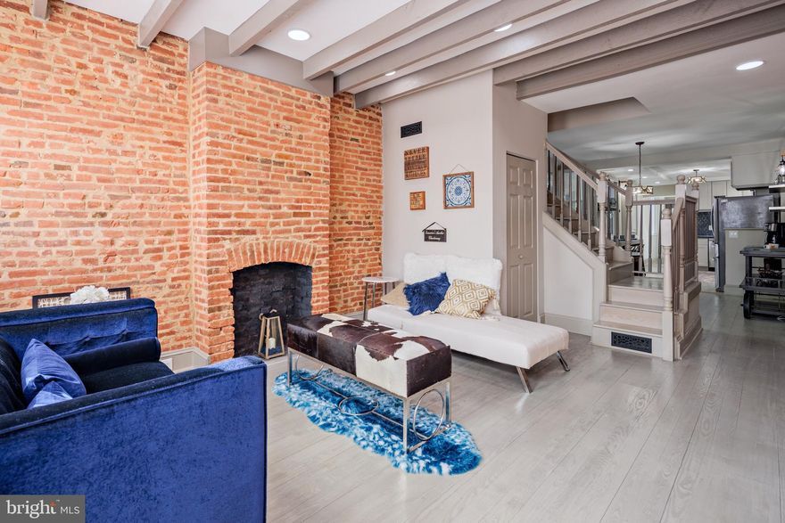 Price Adjustment - Take A 2nd Look! Welcome to 830 S East Ave., where historic charm meets modern luxury in the heart of Canton. This beautifully renovated 3-bedroom, 3-full-bathroom home offers the perfect blend of style and convenience.  Step inside to find gorgeous refinished hardwood floors, exposed brick accents, and sun-drenched living spaces with new recessed lighting. The fully updated kitchen boasts sleek modern appliances, elegant finishes, and ample storage, while all three full bathrooms have been completely transformed with contemporary upgrades. The spacious lower level rec. room features high ceilings (8’), providing endless possibilities for additional living space. Upstairs, the two-tiered rooftop deck offers breathtaking city views, complete with water and electricity access—perfect for a future wet bar or grilling station. Additional highlights include brand-new windows, updated plumbing, 3rd floor mini bar or coffee station, and mini fridge in the dining room/kitchen area for additional beverage storage. Located in Canton neighborhood, this home is just minutes from Patterson Park, The Square, Fells Point, and the Inner Harbor. Don’t miss this incredible opportunity—schedule your showing today! Rear Concrete Pad 13ft wide x 10ft long - Compact Car Parking Buyer To Verify.