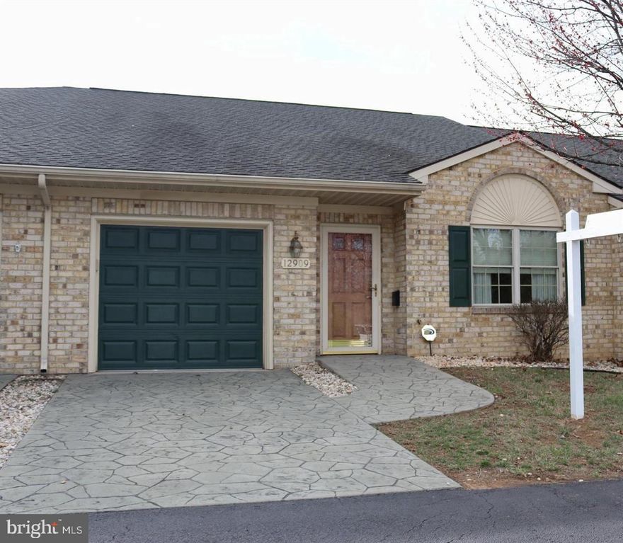 Bright, spacious 2-bedroom, 2-full-bath rancher in Cortland Manor (all-ages, not 55+). Large living and dining area opens to a spacious well-equipped kitchen with abundant cabinetry. Primary suite with en-suite bath and walk-in closet, all-season sunroom, private backyard, plus attached garage and driveway parking. Walk to shops and dining; easy access to I-70, I-81, and US-40.