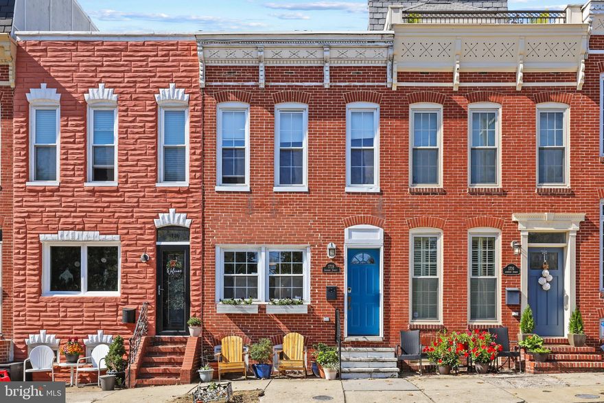 Welcome to 1718 Johnson street, a brick front two-bedroom, two-bathroom townhouse in highly desirable Federal Hill across from Riverside park. Tastefully renovated with an updated kitchen and bathrooms, fresh paint throughout, as well as a new roof this year and a new A/C unit installed in 2022. Main level highlights include a beautiful exposed brick wall, gorgeous wood floors, wood burning fireplace, a welcoming living room, dining room, and an updated kitchen with granite countertops and stainless steel appliances.  The upper level hosts two bedrooms, one with a Murphy bed with an updated ensuite bathroom that also opens to the spacious deck, as well as a second bedroom and full hallway bathroom. Enjoy the convenience of upper-level laundry. The backyard is fully fenced with a patio, perfect for entertaining and relaxation. Plenty of street parking is available. Ideally located in Federal Hill, walking distance to shopping, dining parks and much more.