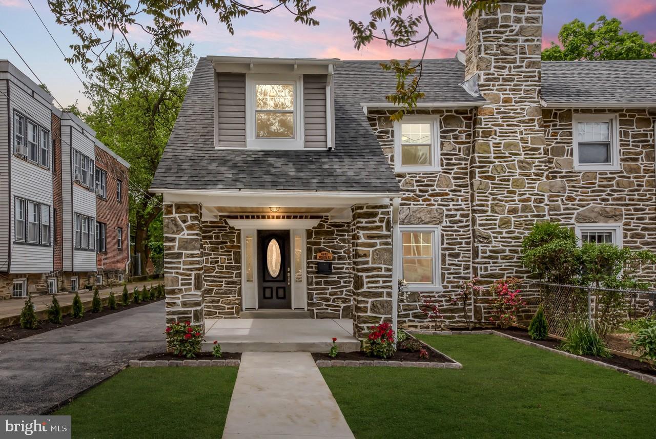Welcome Home to this Classic West Mt. Airy Twin with a modern flair. The open bright and airy floor plan is just what you are looking for. Beautiful hardwood floors through out add that touch of class.  The Kitchen with it's center island, quartz counter tops and stainless appliances is waiting for you best recipes.  The Livingroom with the Original Mantel and  Fireplace is homey and inviting.  Walking upstairs you will find an open hall with a master suite and 3 additional bedrooms, total 4 bedrooms & 2 full baths.  The master suite has a sitting area and a full bath.  To add to this totally rehabbed home your finished basement with powder room and laundry area is open to all your idea's.  A long driveway and attached garage tops off this home.   Walking this well desired area can bring you to the  Carpenter Lane Train Station, Germantown Ave. public transportation, Acme, and the Lovett Memorial Library.  Minutes from Chestnut Hill, Center City,  Wissahickon Creek Park and Lincoln Drive to I76