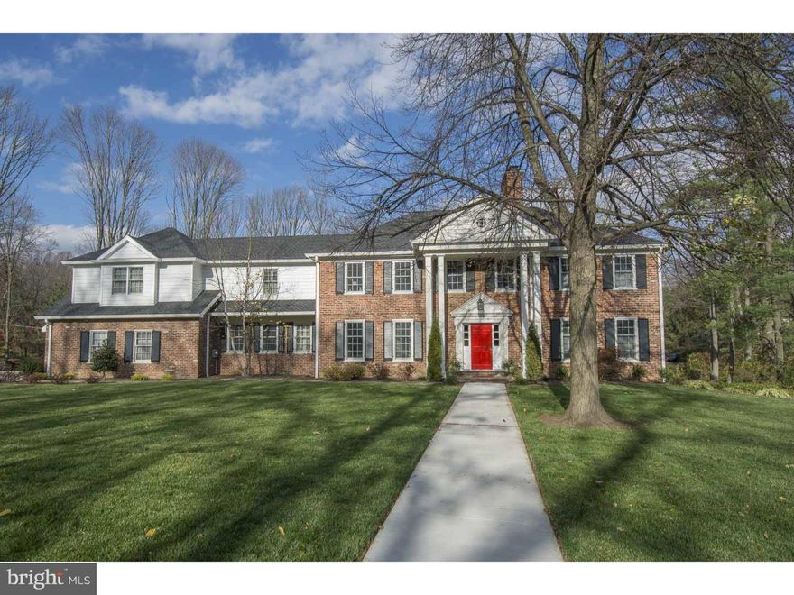 Ideally located in a quiet cul-de-sac on the north side of Villanova.  This traditional brick Georgian home has been beautifully renovated with a new Kitchen addition and new Baths. It is both unpretentious and luxurious.  The entry boasts flagstone flooring, flanked by double coat closets.  The new eat-in kitchen is brightened by a wall of windows, opening up the view to the new deck and rear yard frequented by deer, fox and hawks.  The kitchen, with center island, fireplace and walk-in pantry - together with the adjacent breakfast nook are wrapped in a wall of new windows.  Wide plank WhiteOak floors, granite and marble compliment the extra large stainless refrigerator, 6 burner gas range, two dishwashers and built-in steam and microwave ovens.  Formal living room with a picture window and fireplace, and dining room flow nicely off the main hall. The master suite features a large soaking tub, a separate walk-in shower, and a double vanity; large His and Hers closets and a third Cedar lined closet are a real treat.  The second bedroom is large with its own en-suite and walk in closet, bedrooms 3 and 4 share the hall bath.  On the main level, the fifth bedroom works very well as a guest suite or office. Additional highlights include: 1.49 acres, attached two car garage, ample storage throughout the home, 3 fireplaces, hardwood floors throughout, walk-out finished lower level, a full house emergency generator, new roof, new dual zone HVAC and upgraded electric service, award winning Lower Merion Schools, and access to all major transportation routes and everything the Main Line has to offer.
