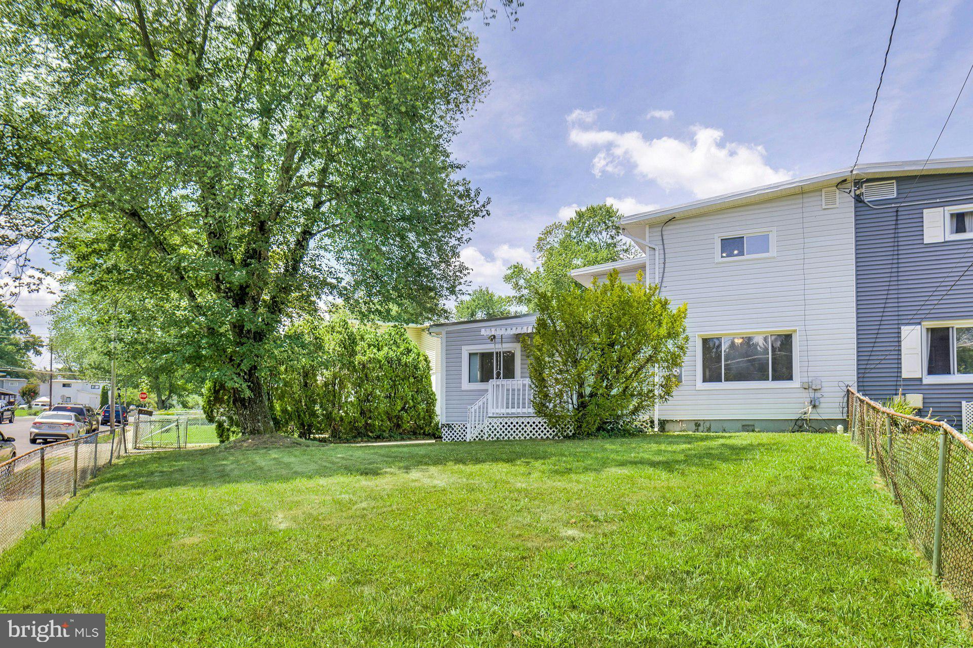 Charming Duplex in Fairfax City...Larger than most others in the neighborhood! Step into this mid-century home with modern updates. Enter into the huge living room with large windows and plenty of room for relaxing and entertaining. Formal Dining Room and Bonus Room directly off Living Room and a modernized kitchen, full bath, and laundry area complete the main level. Upstairs find the Main Bedroom with large closet and extra storage space, 2 impressive secondary bedrooms and an updated full bath. If that is not enough, you can enjoy the peaceful, fenced patio and back yard. This larger than average, corner lot home has room for you to personalize, but does not disappoint in any way! Come check it out!