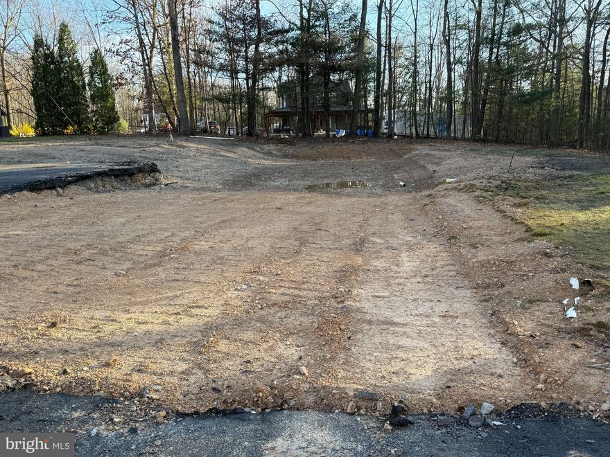 PRICE REDUCTION!!  This 2-acre lot is ready for you to build your dream home! A fire destroyed the original house in January 2025, but the land has been cleared for construction. Utilities, including a well and septic system, are already in place, although the seller is unsure about their condition. Electricity has been connected to the lot, and the driveway is fully paved.

Located in Robinwood Retreat, this property offers an excellent combination of building space and the oversized garage or pole barn is already there, all while enjoying complete privacy. Additionally, dirt bike trails on the property provide year-round fun, and it's only 15 minutes from Tomahawk Motocross, a great destination for dirt bike enthusiasts! Easy access to local shopping, dining, and schools