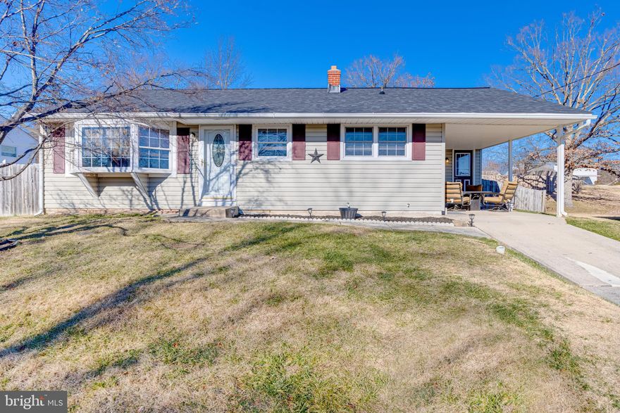 Welcome to this updated 4 bed 2 bath rancher convenient to shopping, dining, APG and I-95.  This home has a brand new roof, new HVAC, hot water heater and has a fully fenced yard.  Pull into the driveway and park under the carport, take the walkway two the front door or enter in through the side door to the kitchen.  The kitchen is fully updated with granite countertops, backsplash, deep porcelain sink, stainless steel appliances and custom cabinetry.  The entire first floor is covered in wood flooring and has an open concept where the kitchen looks out over a dining area and into the living room.  The living room has a large recessed bay window to allow great light into the home.  A hallway off of the main living area leads to an owners suite on the left with its own full bath, and on the right are two more bedrooms and a second full bath.  Taking the stairs to the fully finished basement leads to another large carpeted family room, and another (potentially 4th) bedroom, as well as a large laundry and storage room with another bonus room in the back.  This house is move in ready, fully updated and ready for you to move in today!